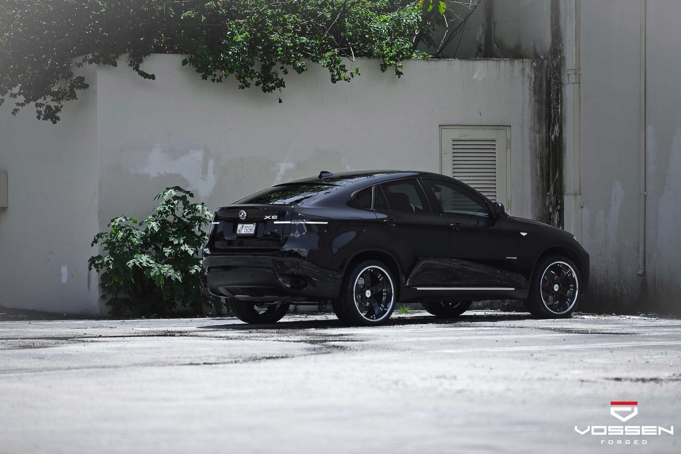 Black BMW X6 with Running Boards - Photo by Vossen