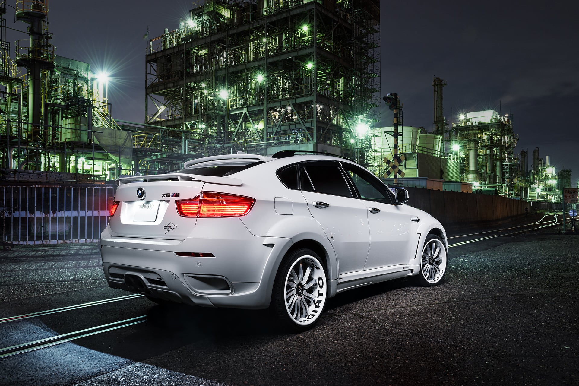 White BMW X6 with Aftermarket Rear Spoiler - Photo by Forgiato