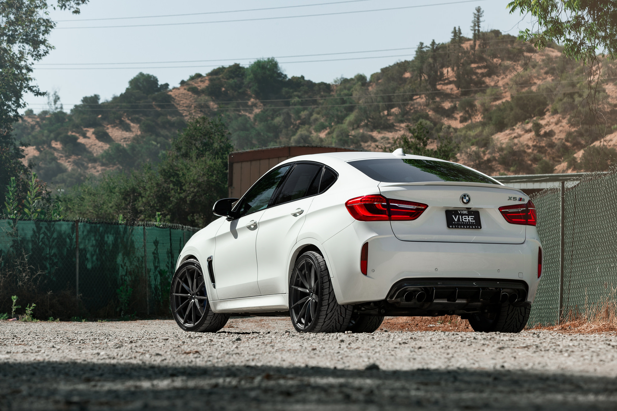 Rear Lip Spoiler on White BMW X6 - Photo by Vorsteiner