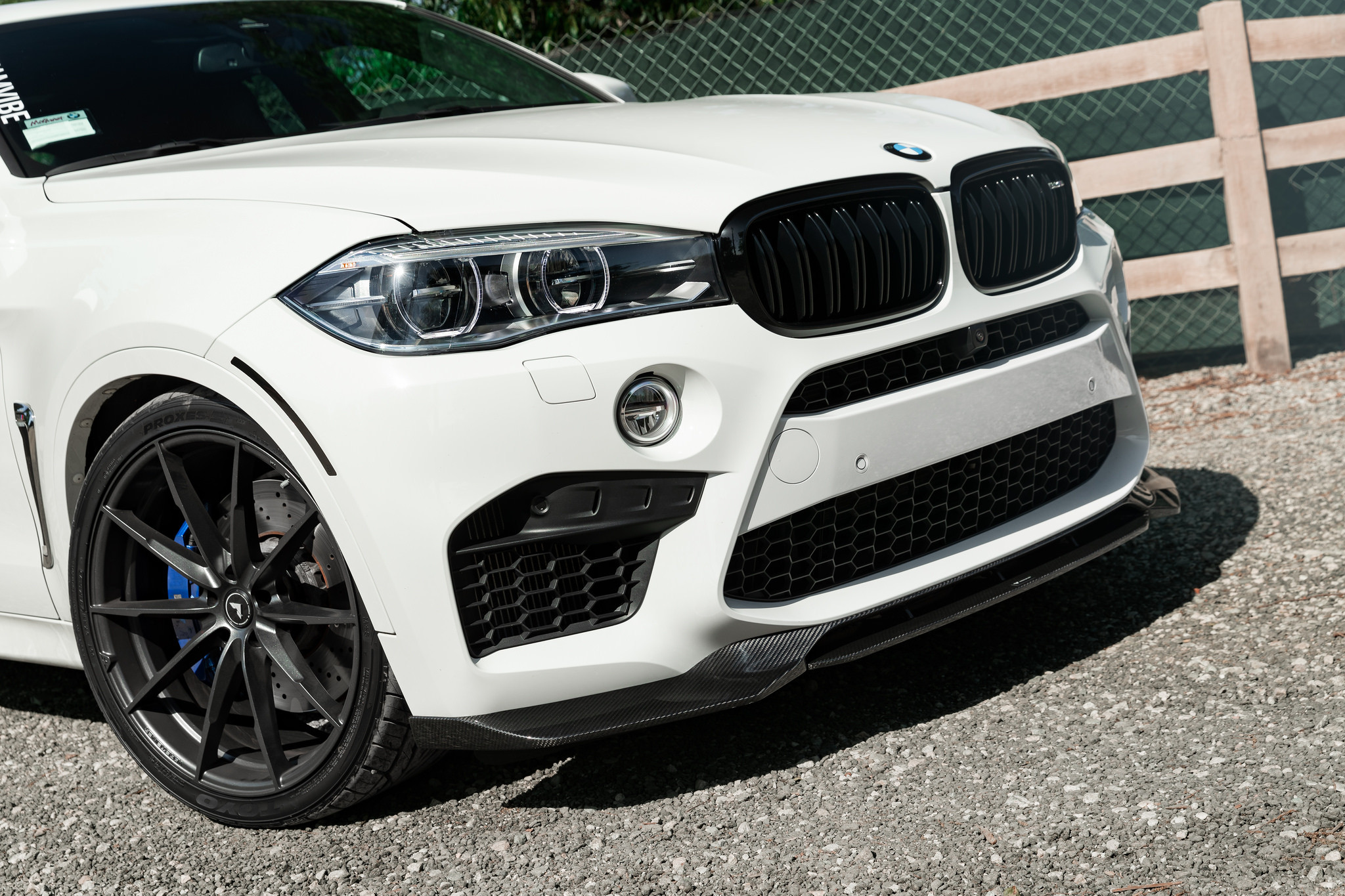 White BMW X6 with Carbon Fiber Front Bumper Lip - Photo by Vorsteiner
