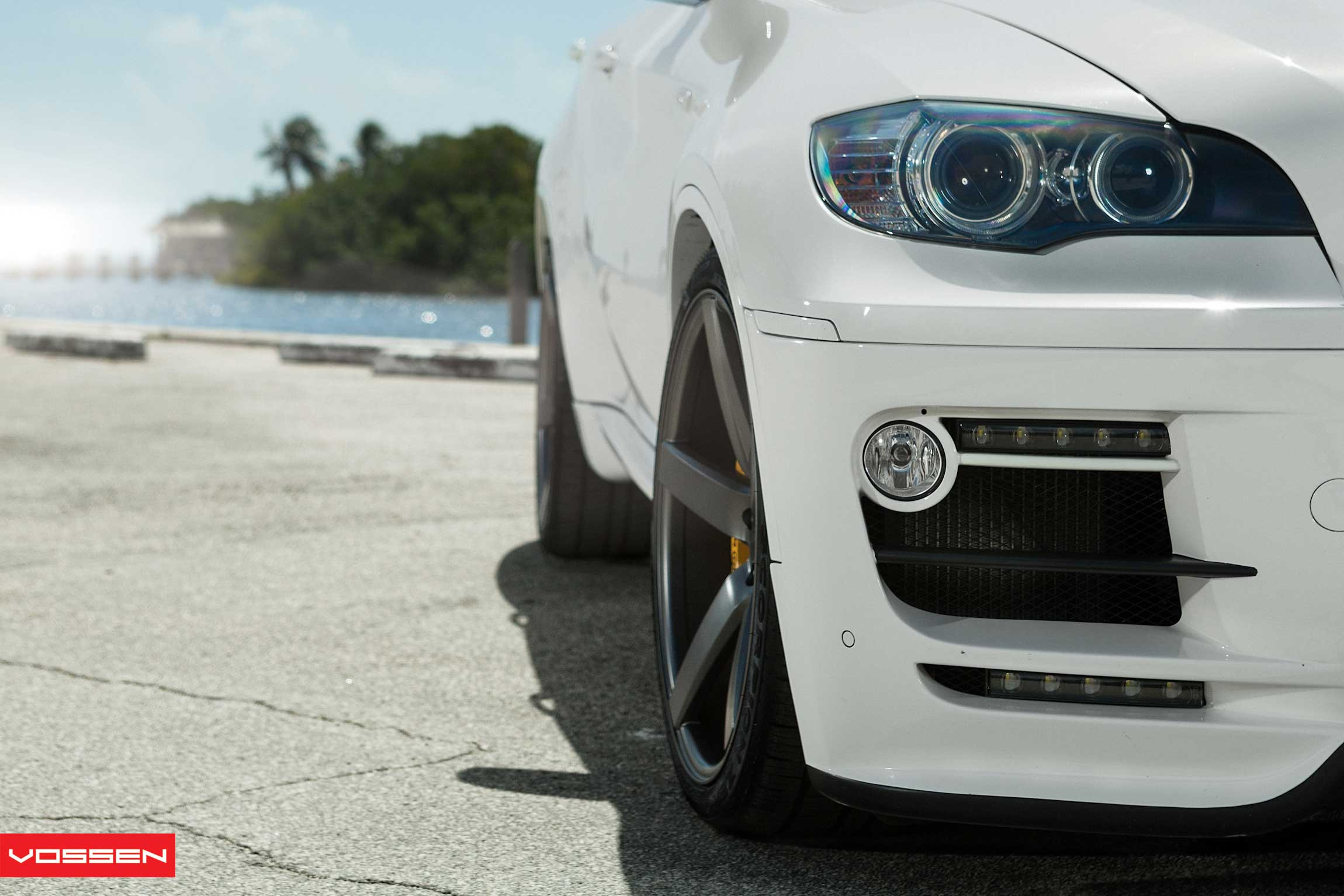 White BMW X6 with Aftermarket Halo Headlights - Photo by Vossen
