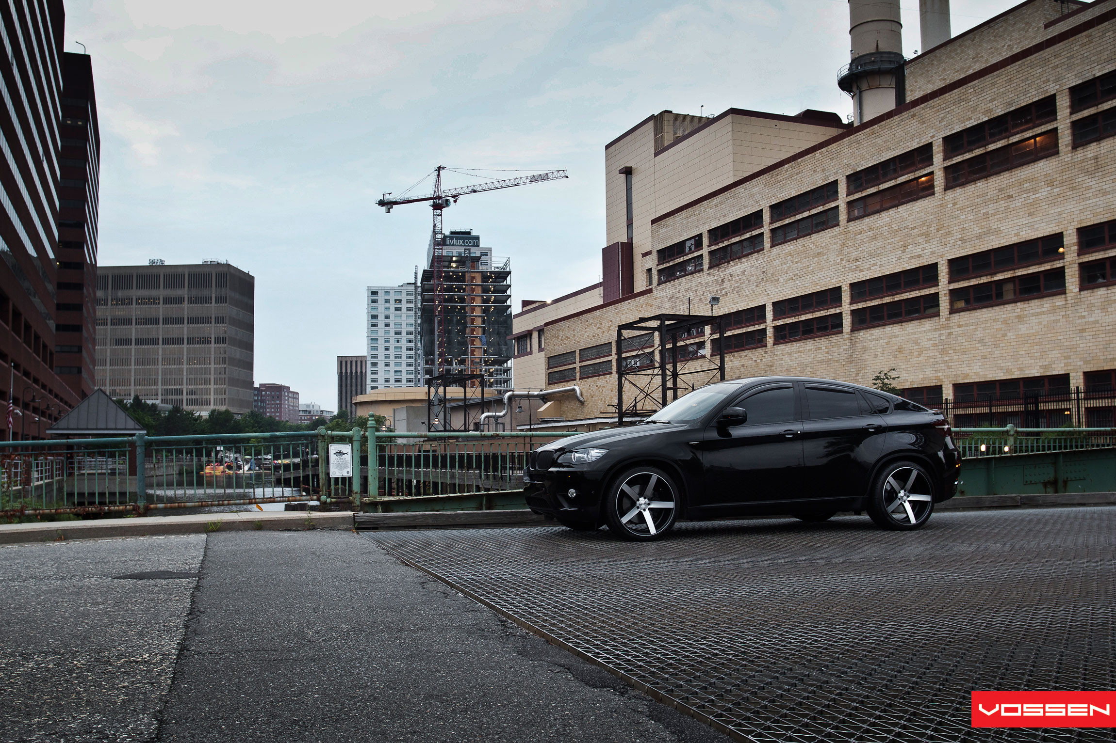 Black BMW X6 with Custom Headlights - Photo by Vossen