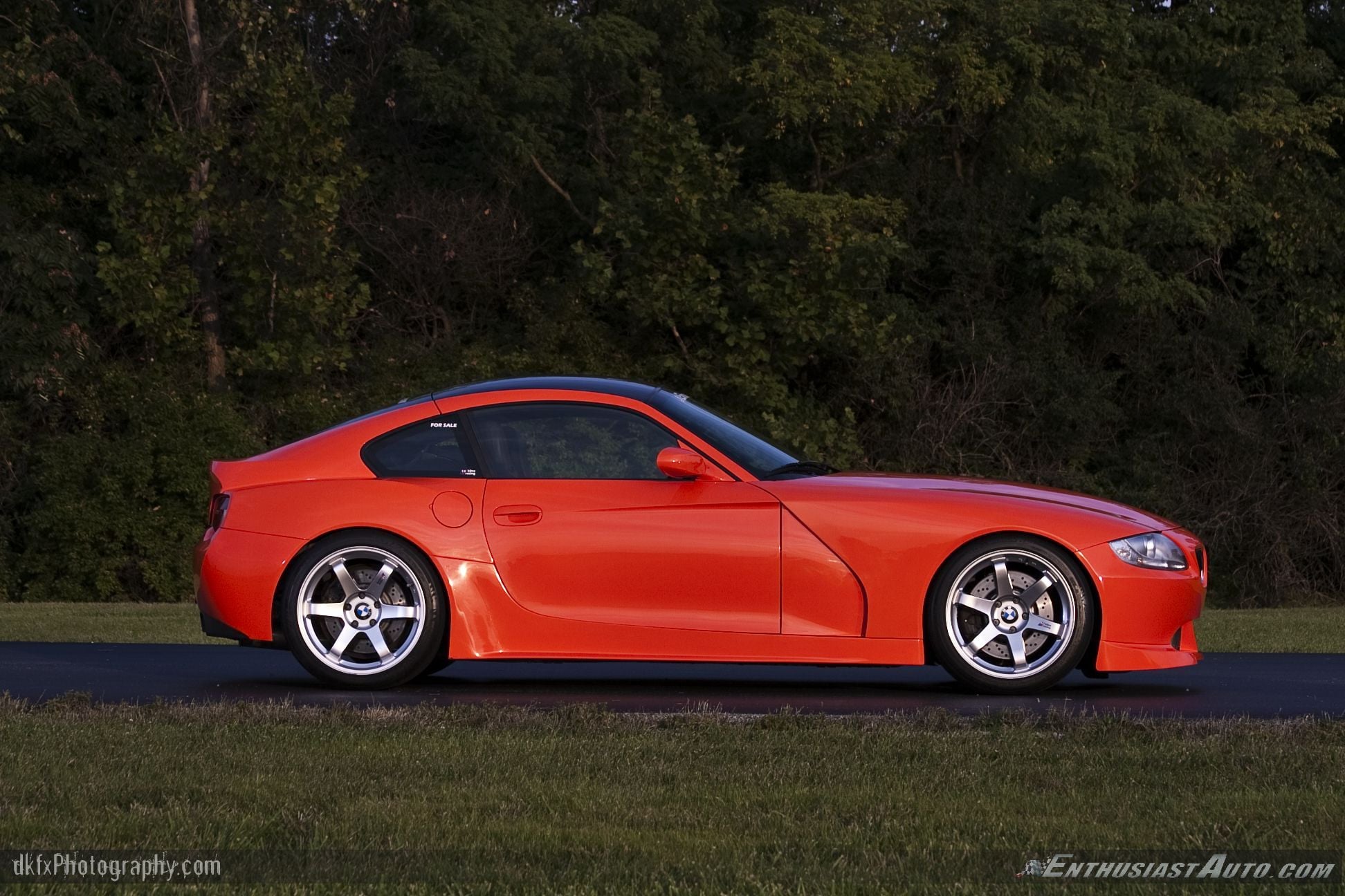 Red BMW Z4 with Aftermarket Side Skirts - Photo by dan kinzie