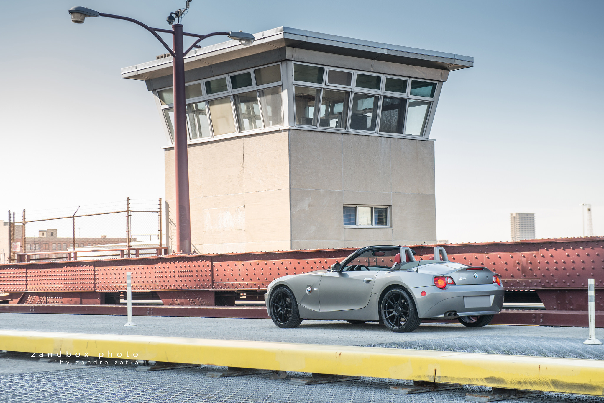 Aftermarket Side Skirts on Gray Convertible BMW Z4 - Photo by zandbox