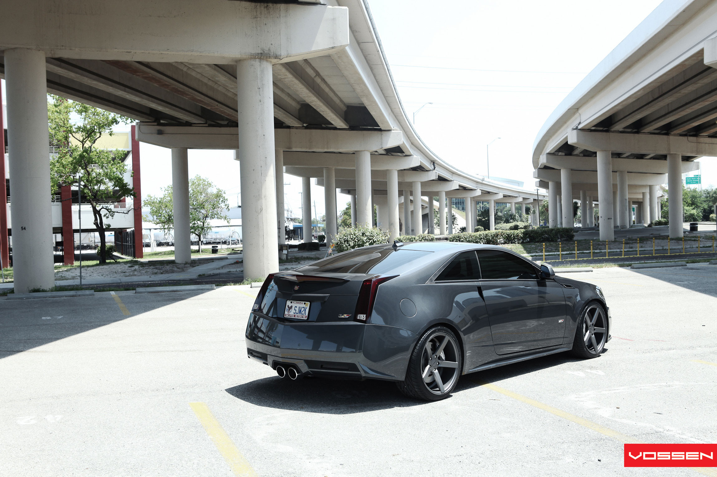 Cadillac CTS with Red Smoke Aftermarket Taillights - Photo by Vossen