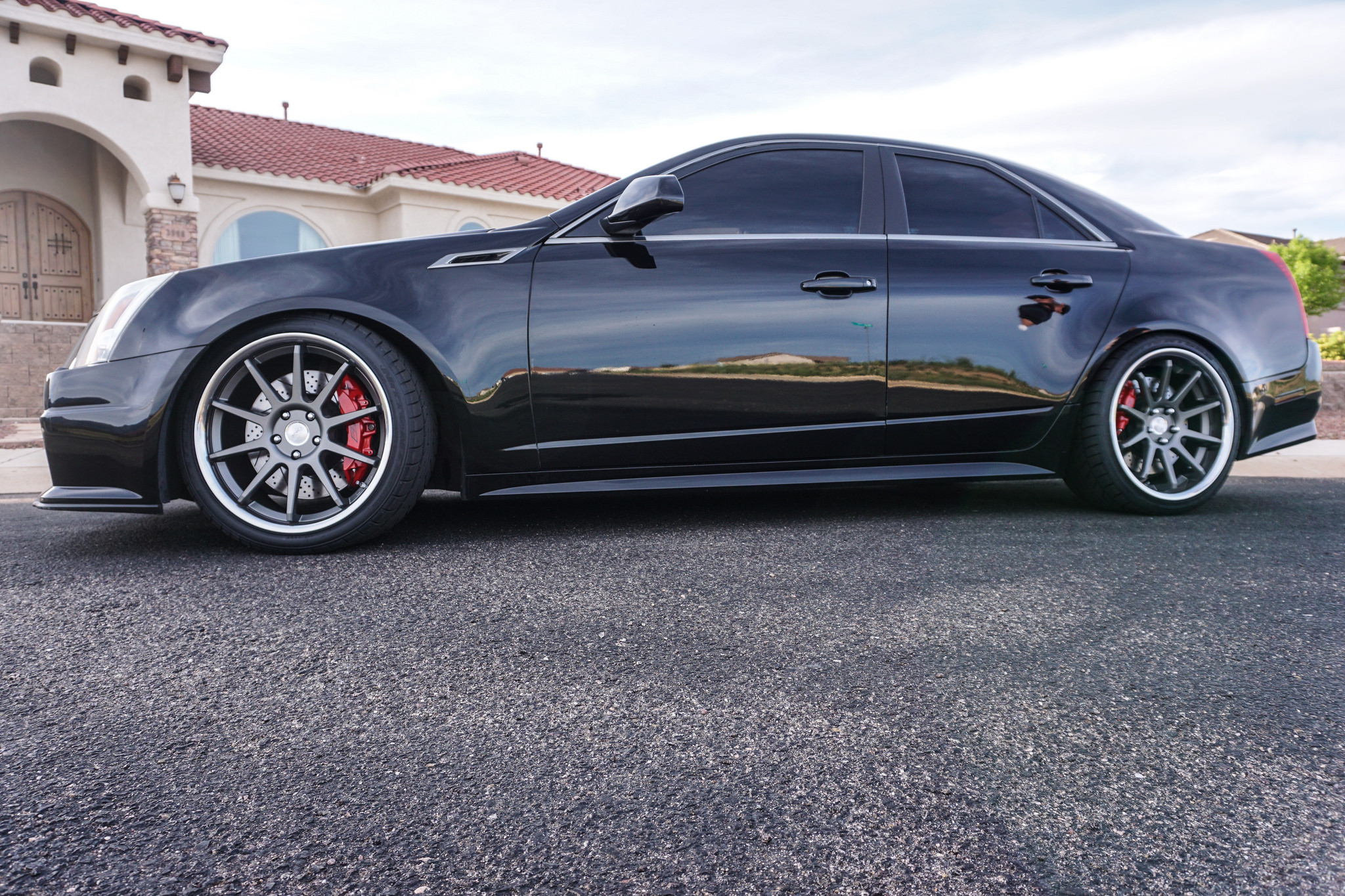 Black Cadillac CTS with Gunmetal Concept One Wheels - Photo by Concept One