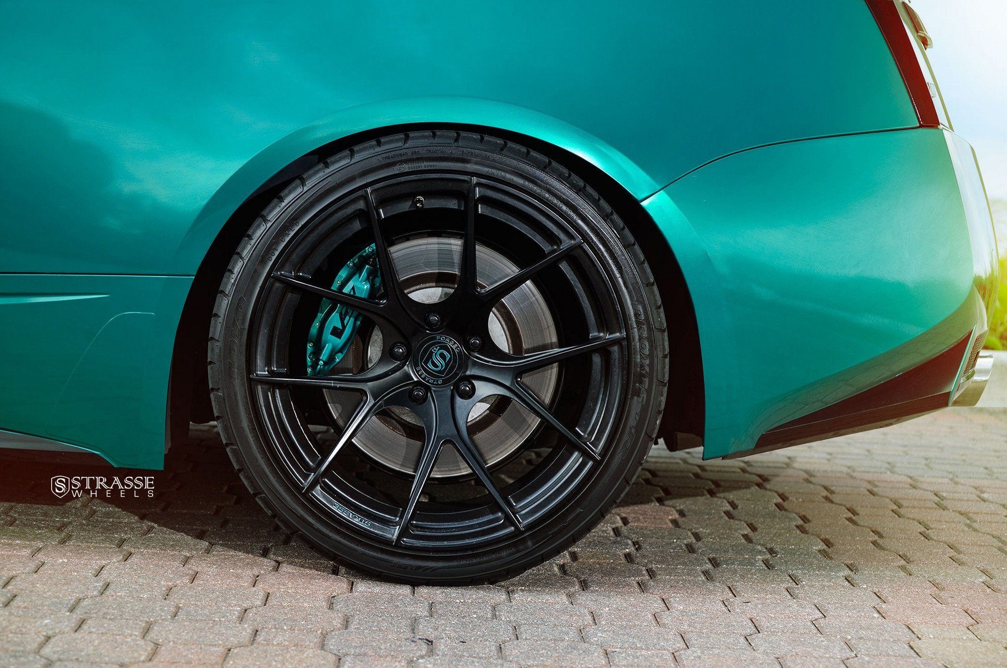 Forged Strasse Wheels on Green Cadillac CTS - Photo by Strasse Forged
