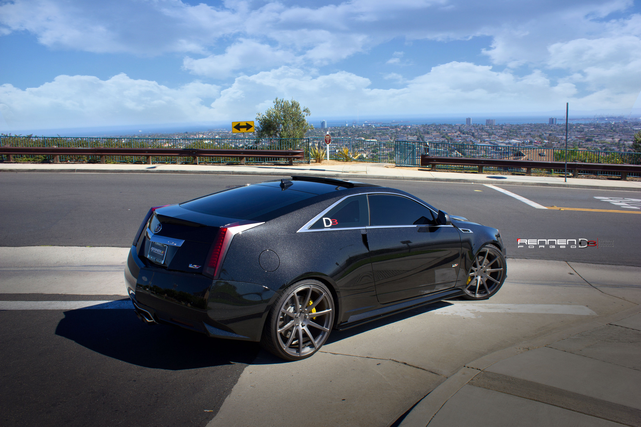 Custom Rear Diffuser on Gray Cadillac CTS - Photo by Rennen International