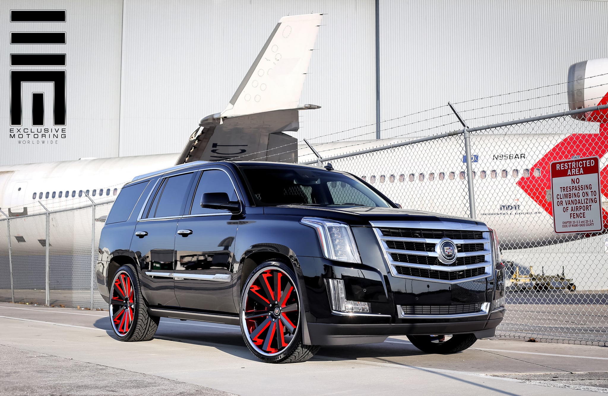 Cadillac Escalade on Custom Rims With Red Accents - Photo by Exclusive Motoring