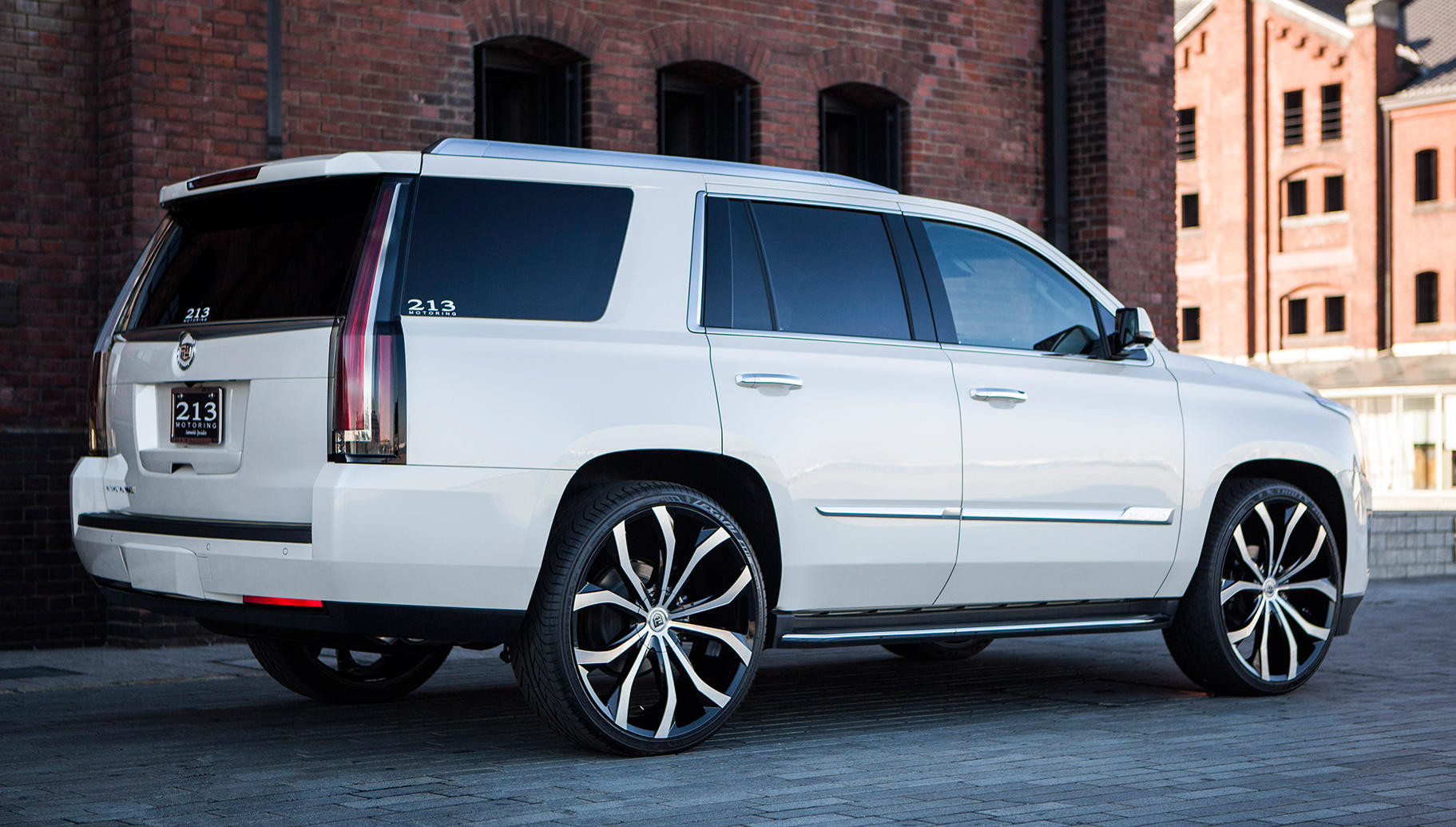 Cadillac Escalade on Machined and Black Custom Wheels - Photo by Lexani