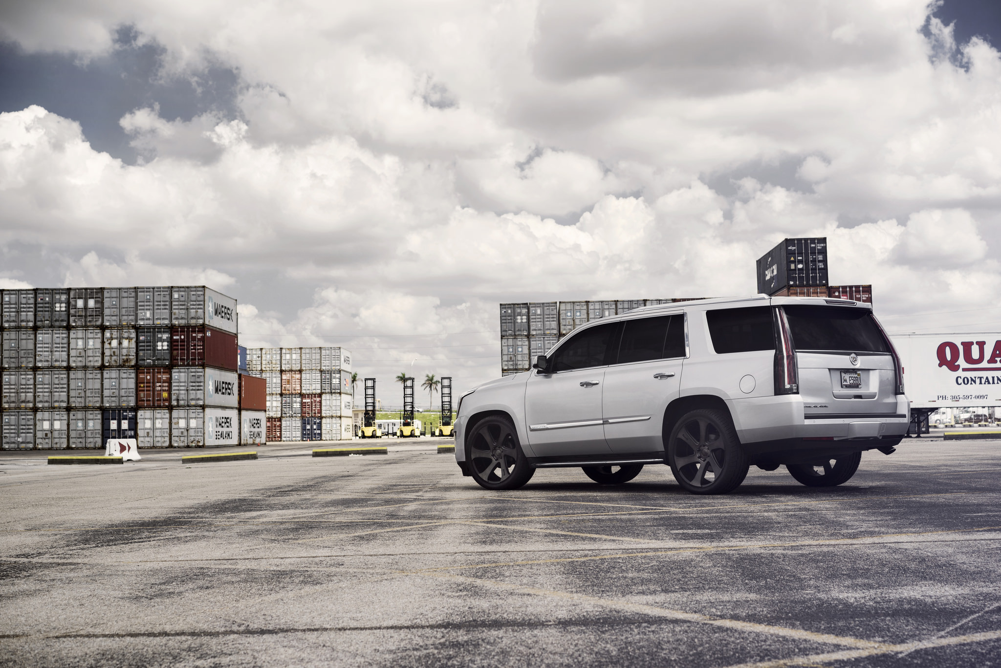 Lifted Cadillac Escalade with Aftermarket Running Boards - Photo by DUB