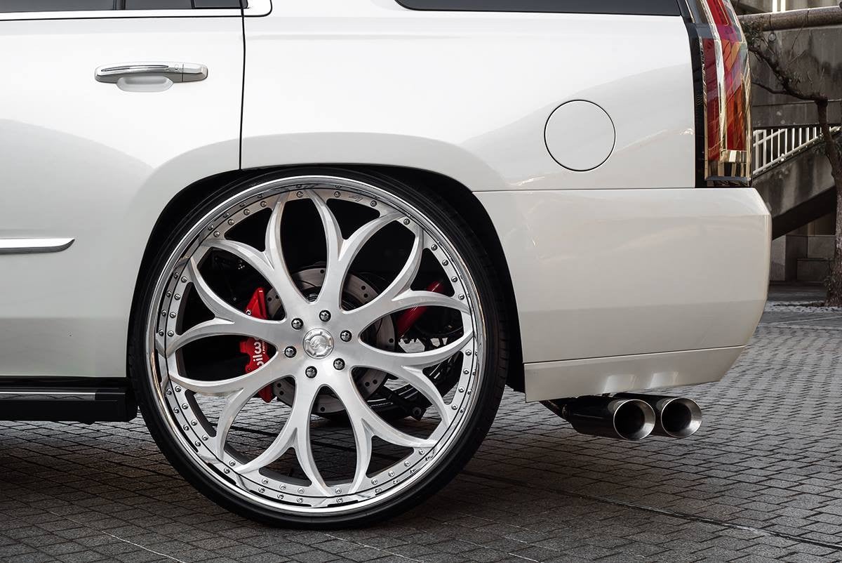 Lexani Rims with Red Brakes on White Cadillac Escalade - Photo by Lexani