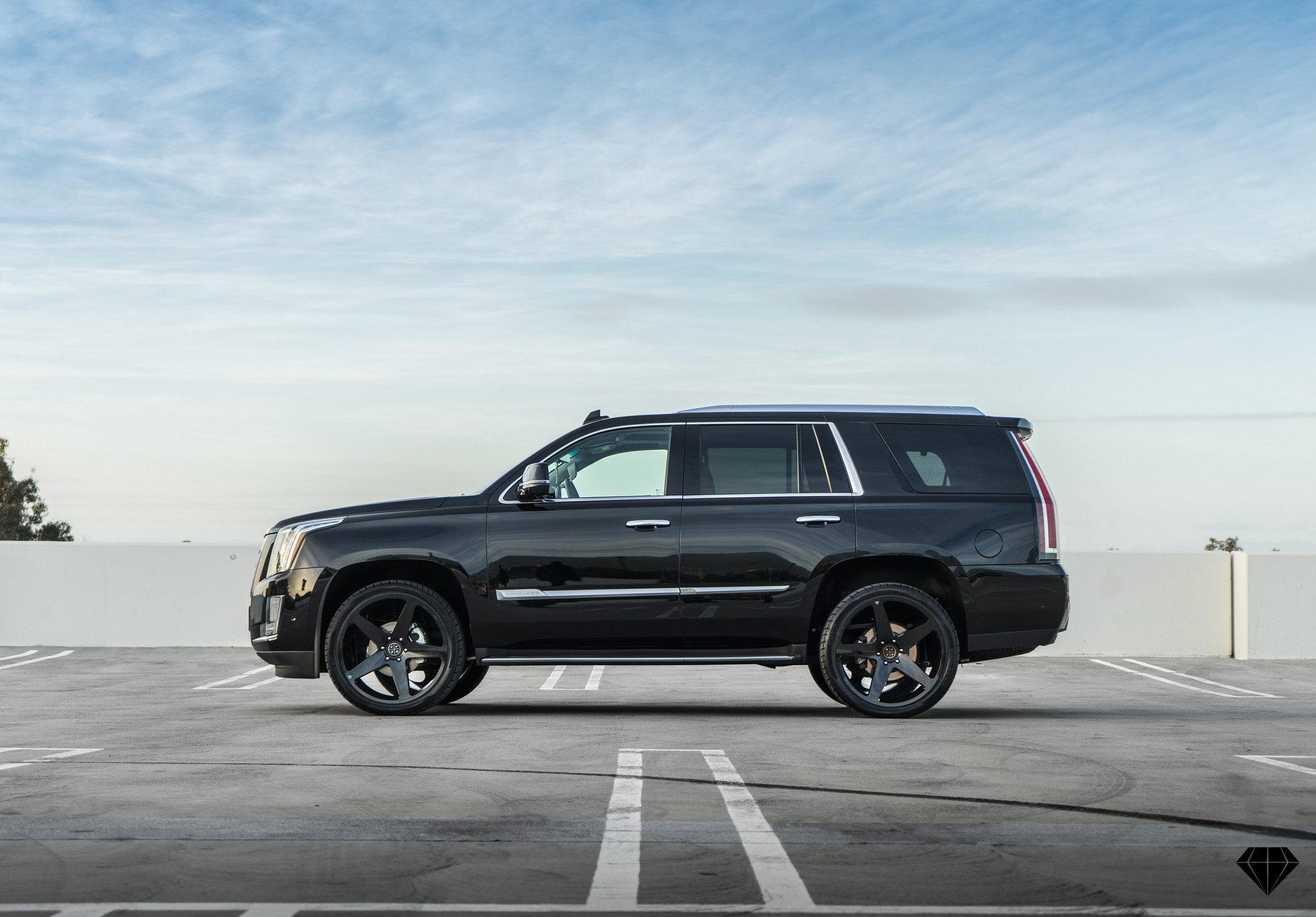 Blaque Diamond Wheels on Custom Black Cadillac Escalade - Photo by Blaque Diamond Wheels
