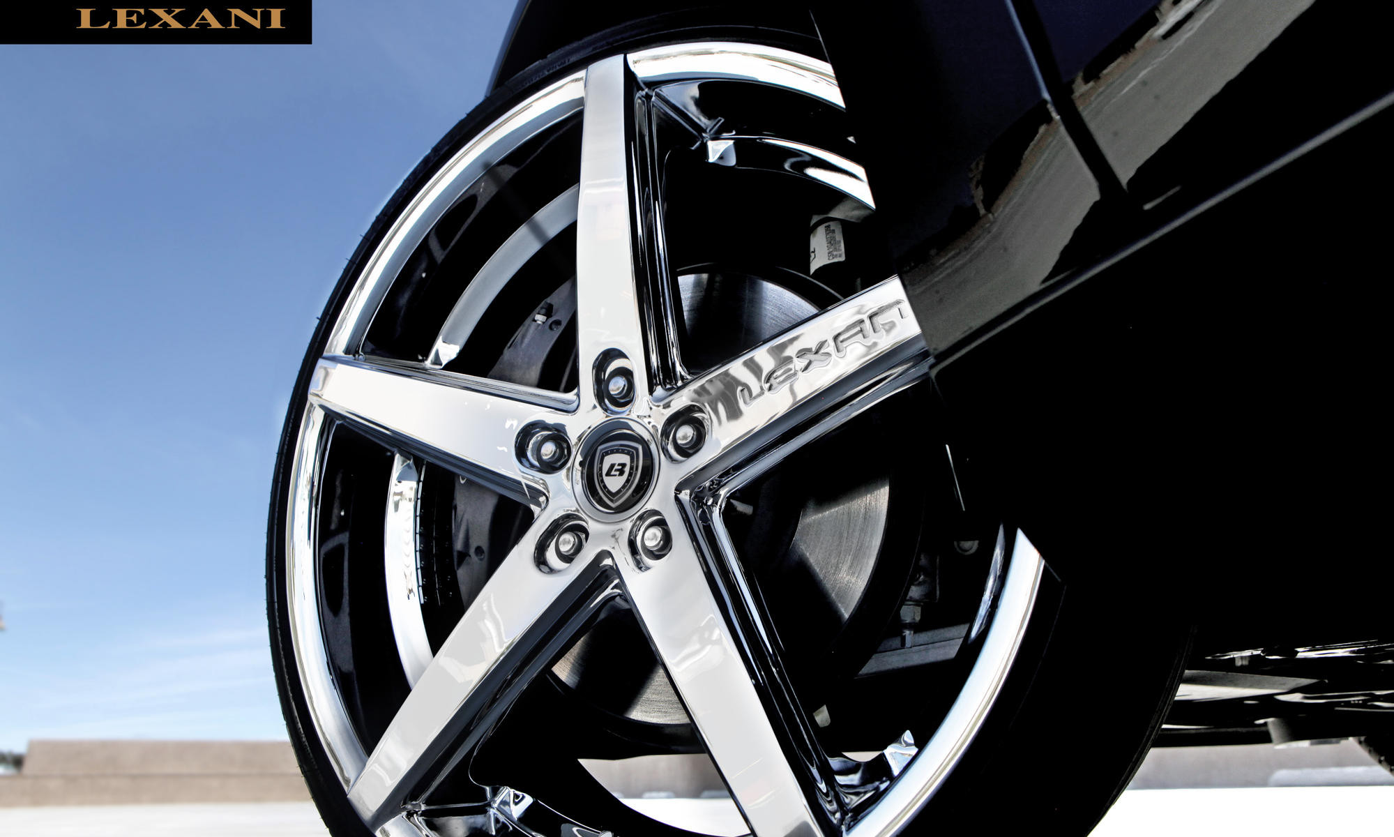 Lexani Chrome R-Four Series Wheels on Cadillac XTS - Photo by Lexani