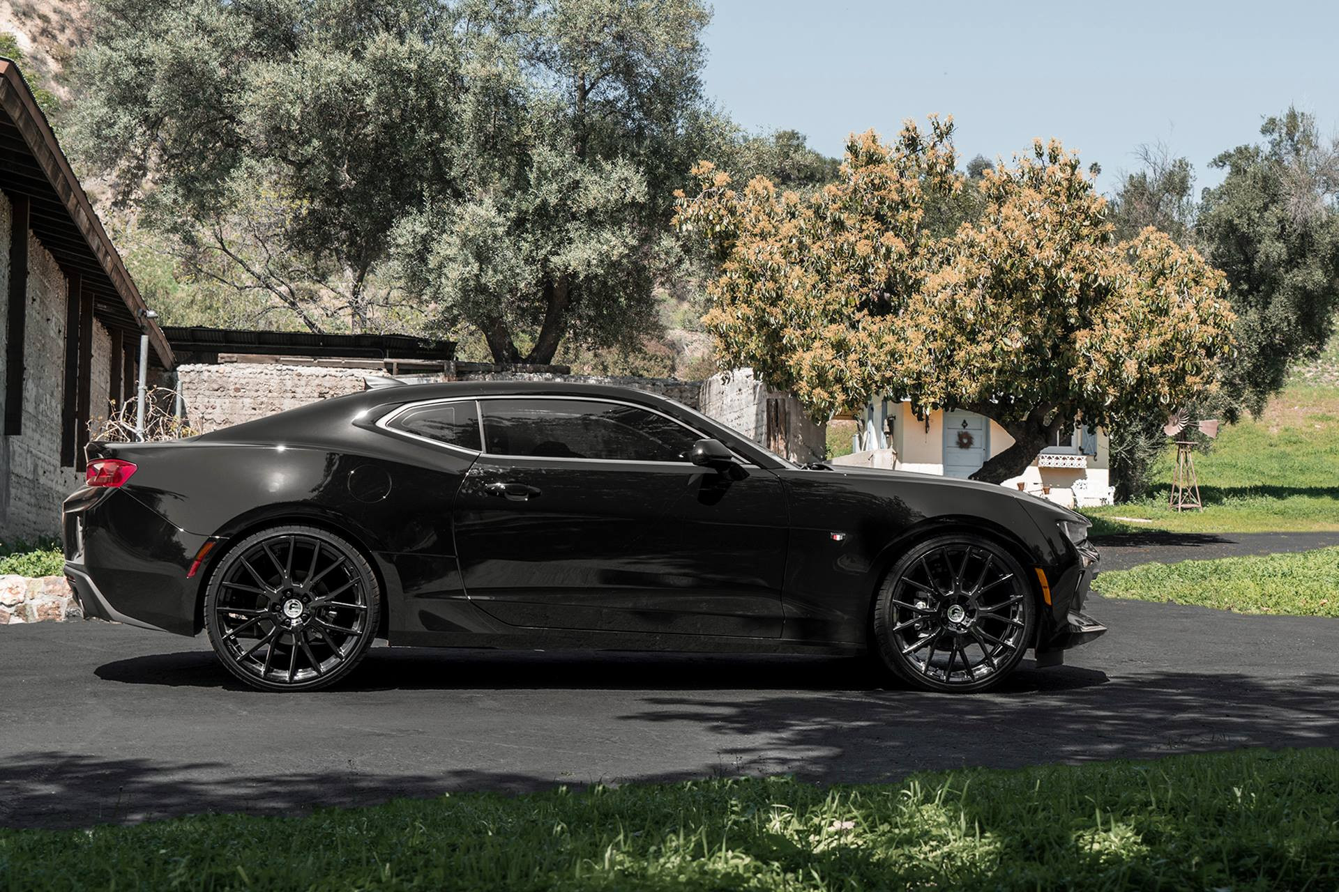 Aftermarket Side Skirts on Black Chevy Camaro - Photo by Forgiato