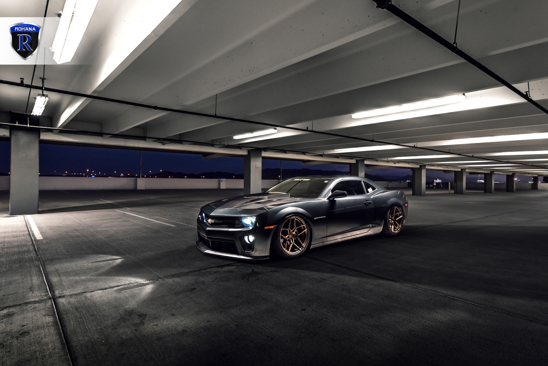 Black Chevy Camaro with Custom Halo Headlights - Photo by Rohana Wheels