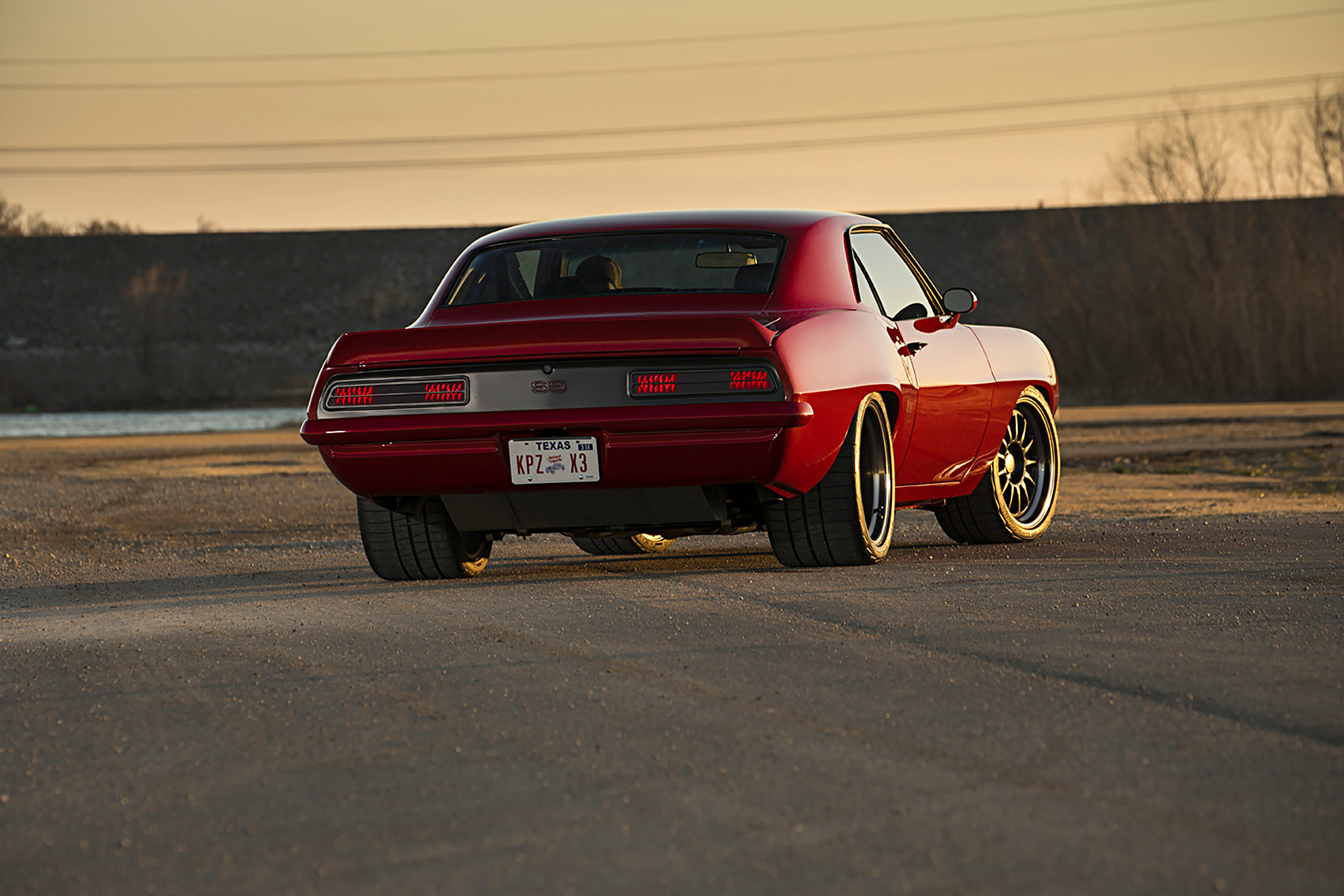 Red Chevy Camaro SS with Custom Style Rear Spoiler - Photo by Stephen Kim
