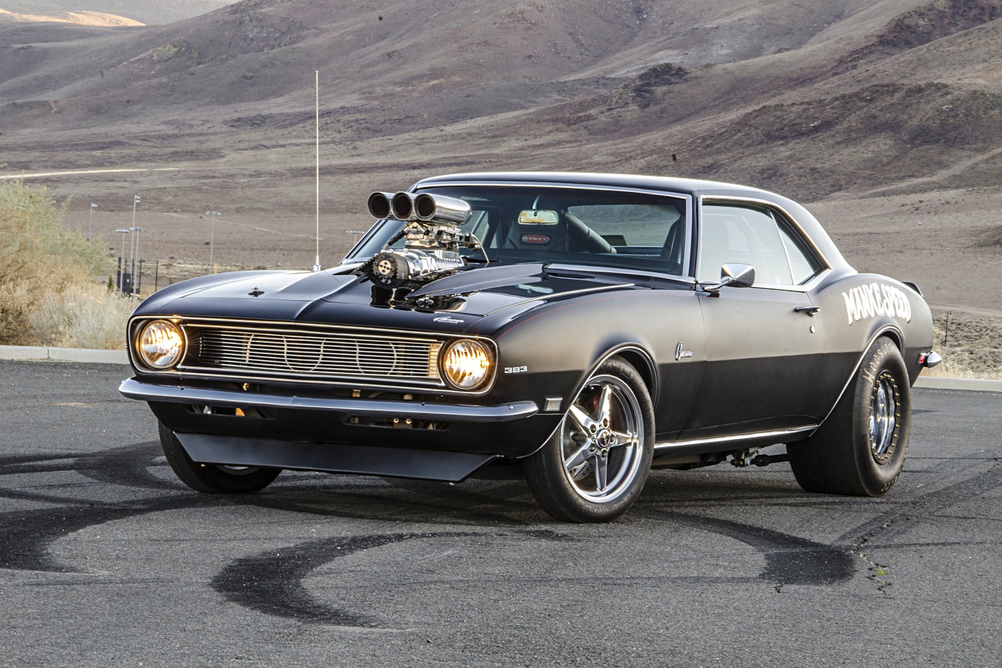 Black Chevy Camaro 383 with Yellow Headlights - Photo by Steve Temple