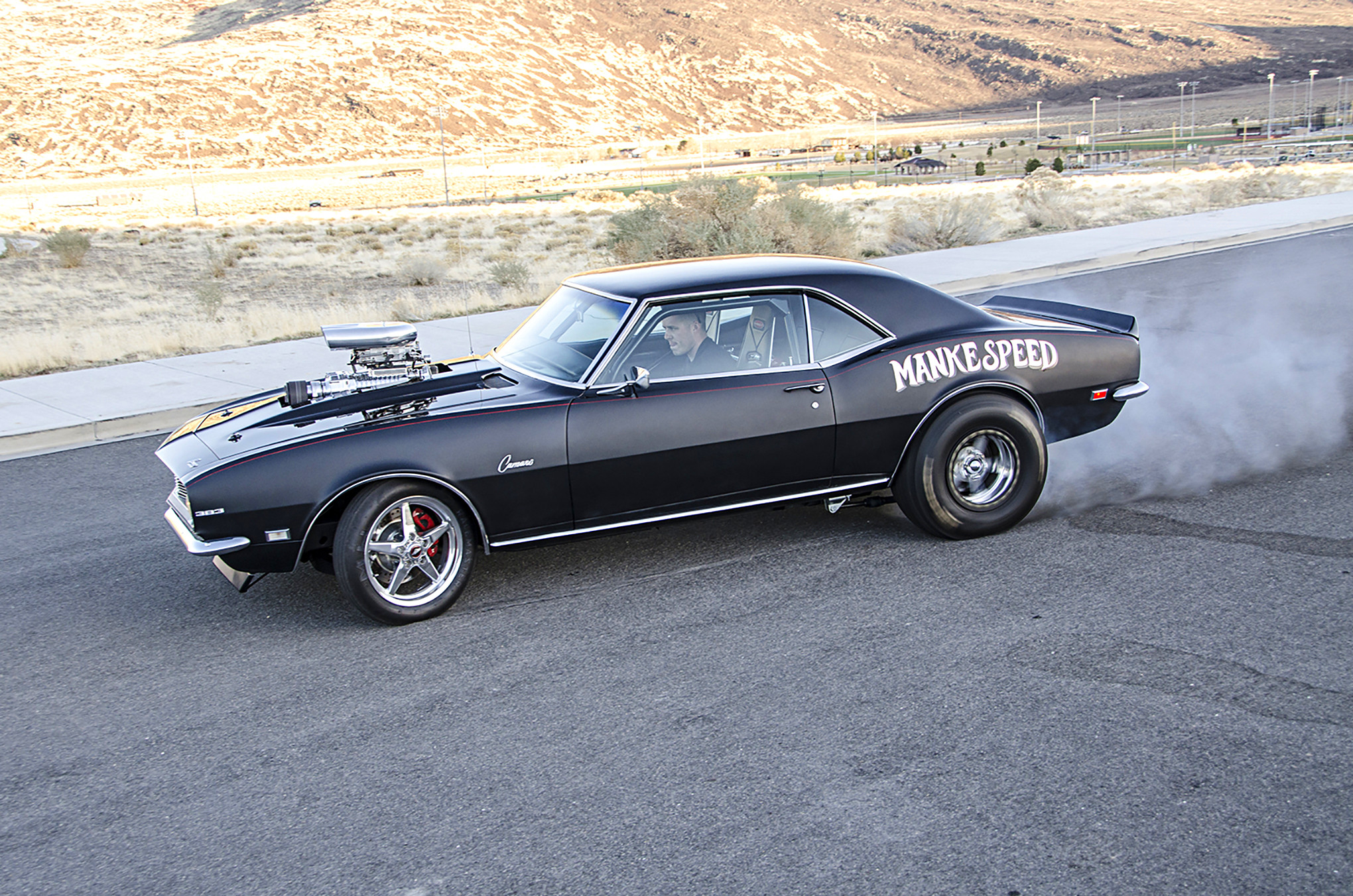 Black Chevy Camaro 383 with Custom Chrome Wheels - Photo by Steve Temple