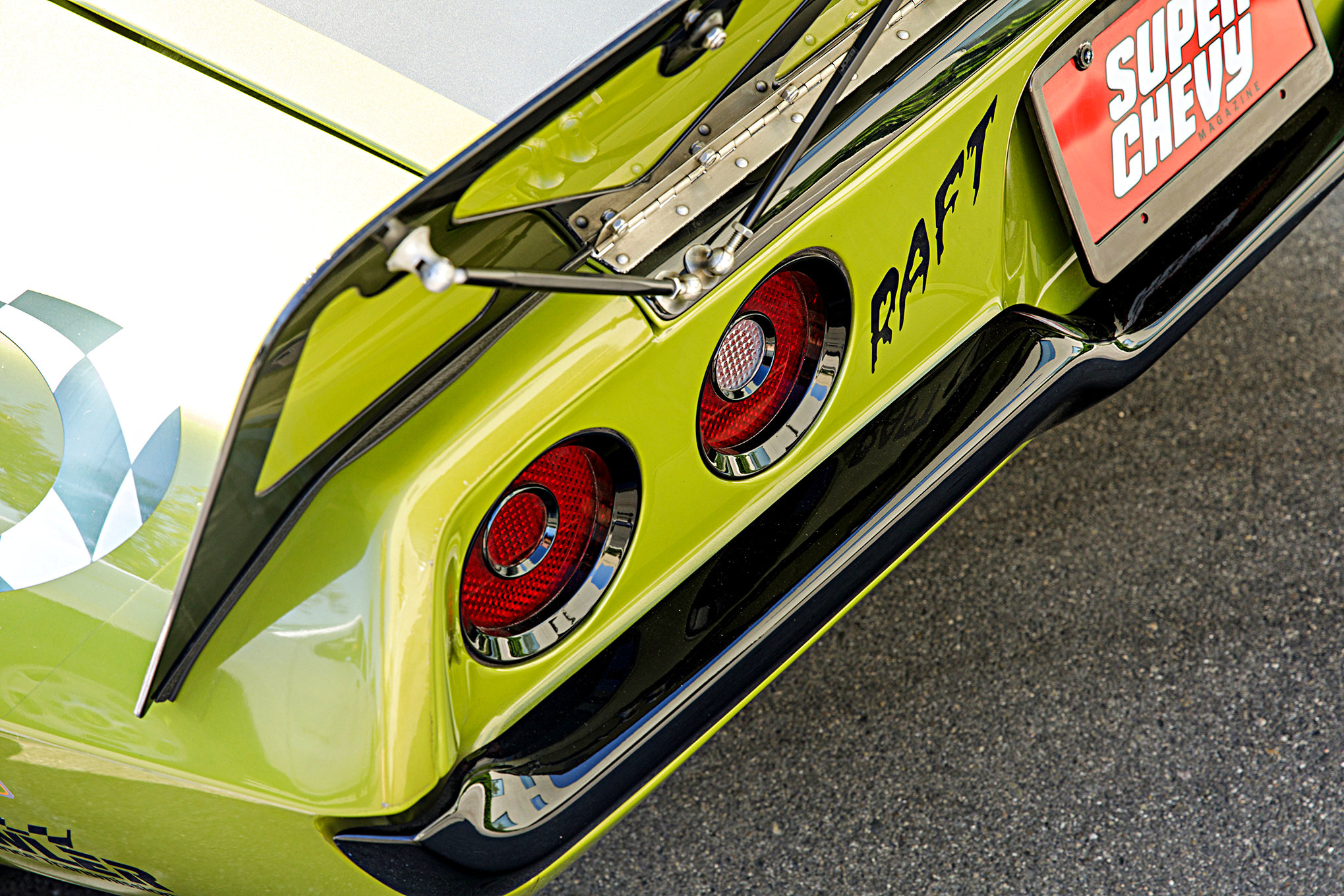 Red LED Taillights on Green Debadged Chevy Camaro - Photo by Robert McGaffin and Super Chevy Staff