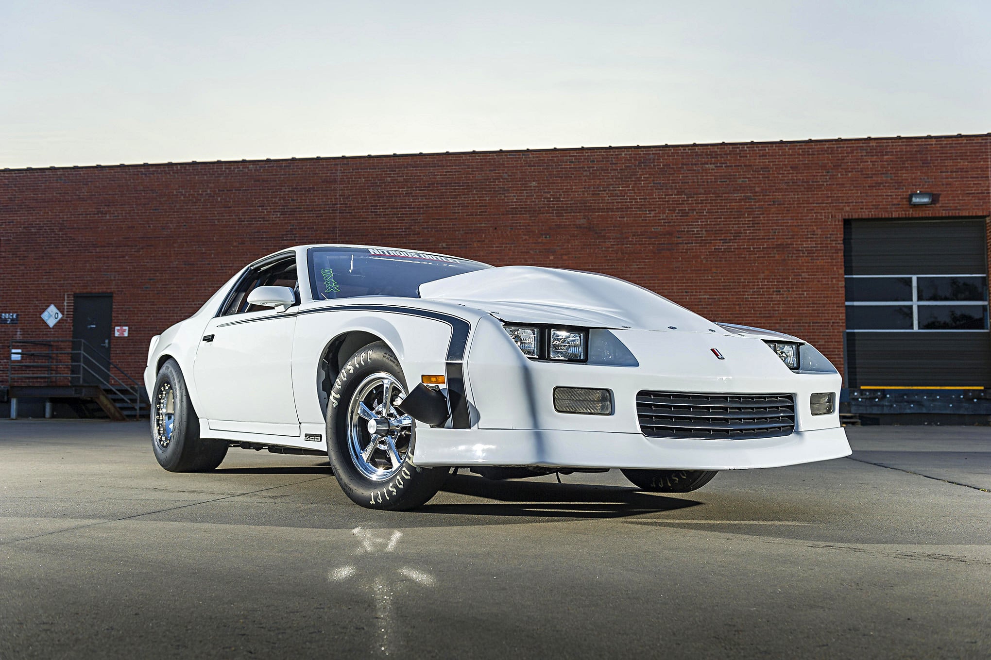 White Chevy Camaro with Custom Front Bumper - Photo by Grant Cox