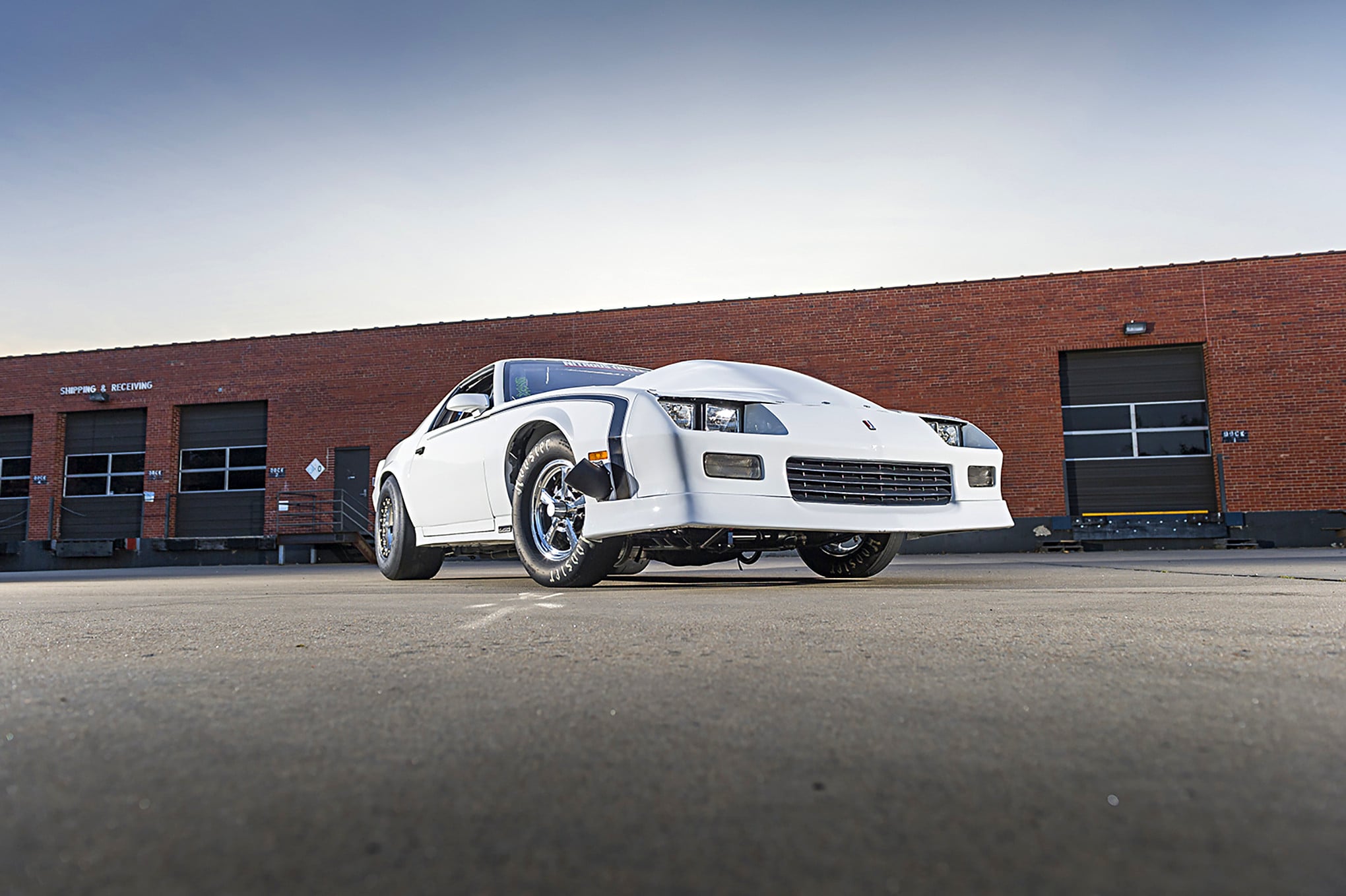 Custom White Chevy Camaro on Mickey Thompson Tires - Photo by Grant Cox