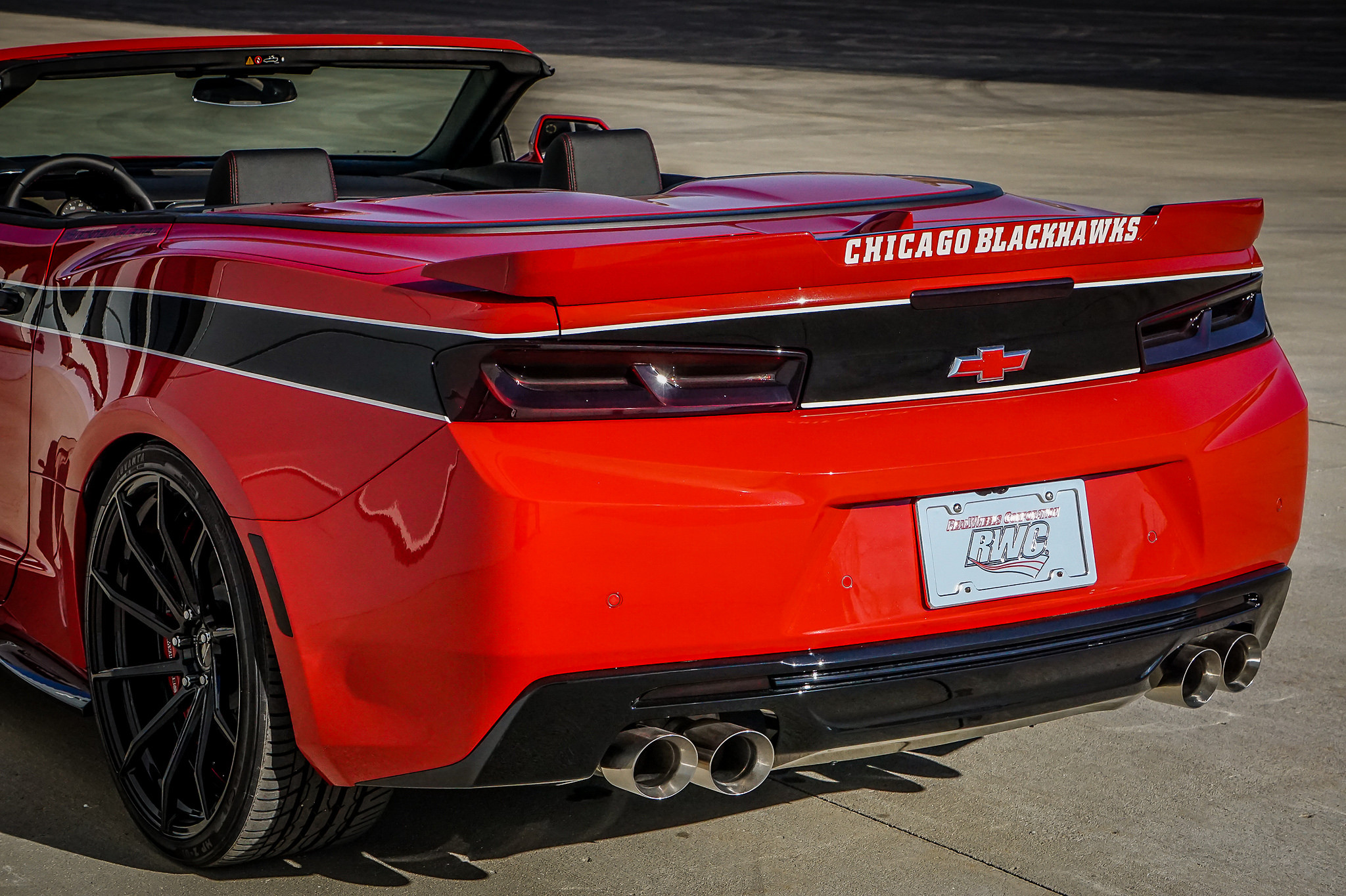 Red Convertible Chevy Camaro with Aftermarket Rear Spoiler - Photo by B-Forged Performance Wheels