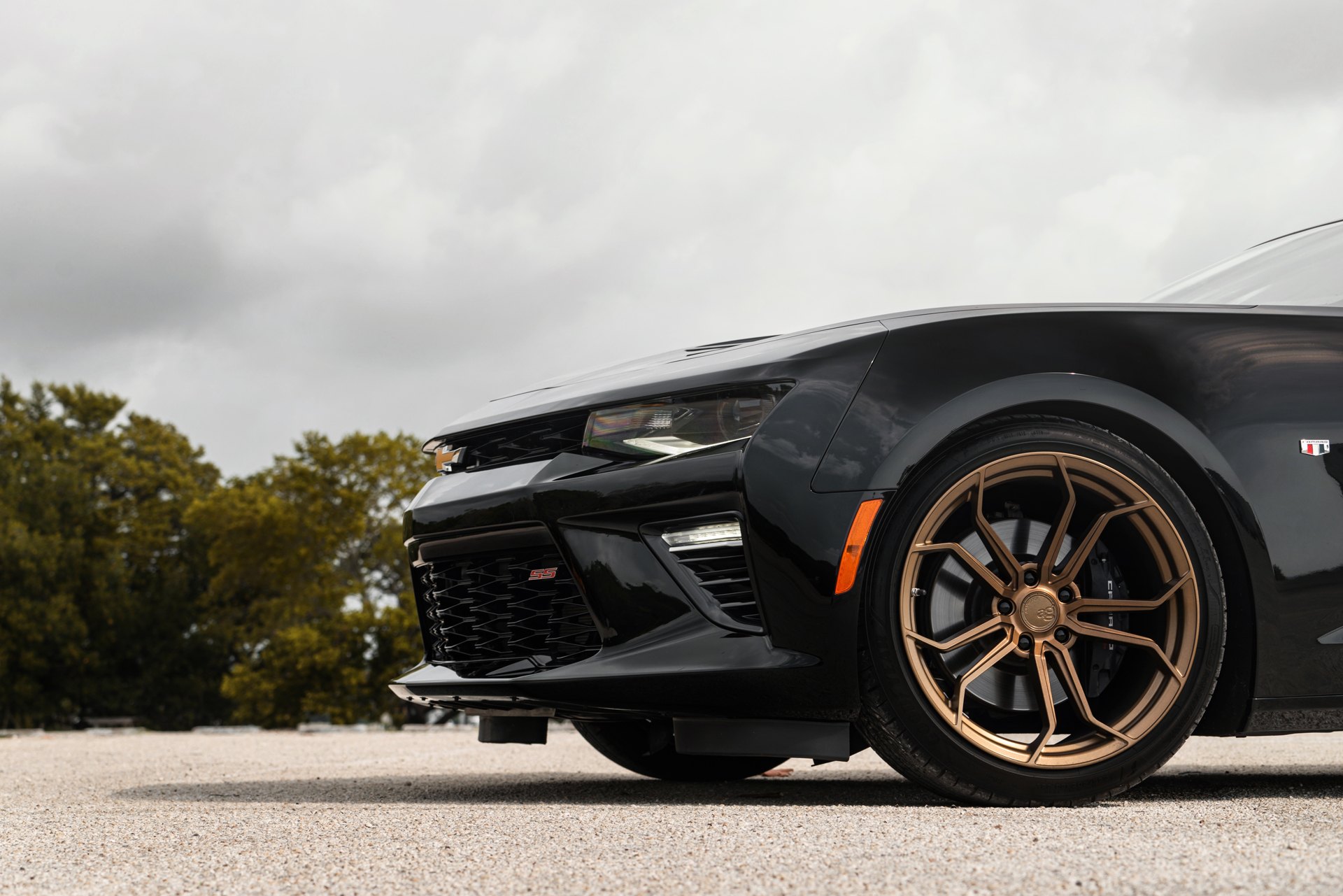 6th Gen Chevy Camaro SS on Bronze Custom Rims.