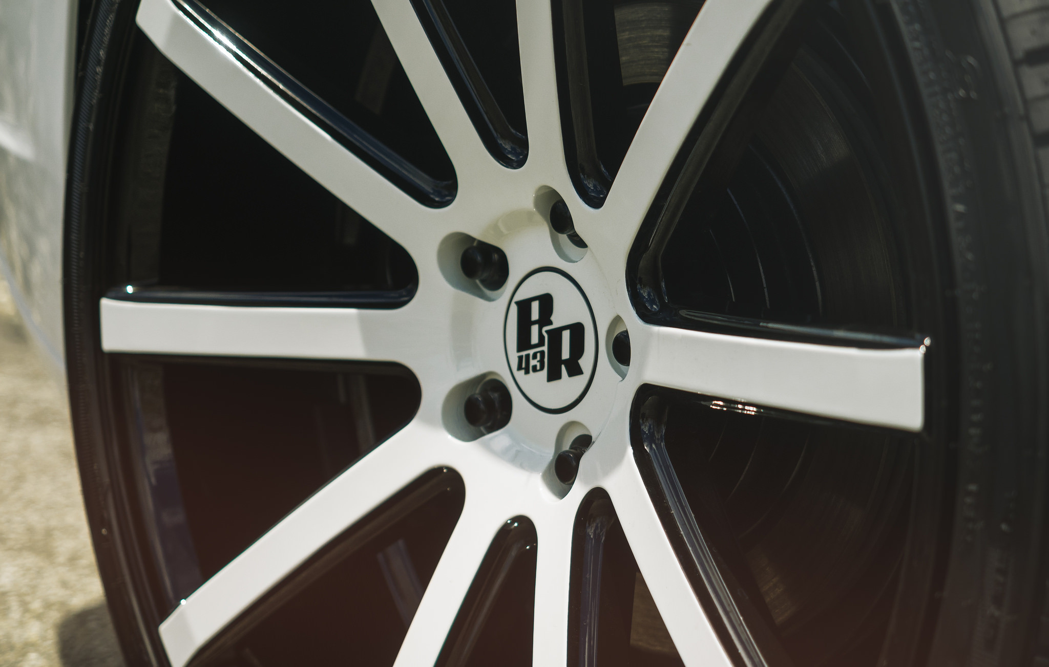 Custom Rims With Personalized Center Caps - Photo by XO Luxury