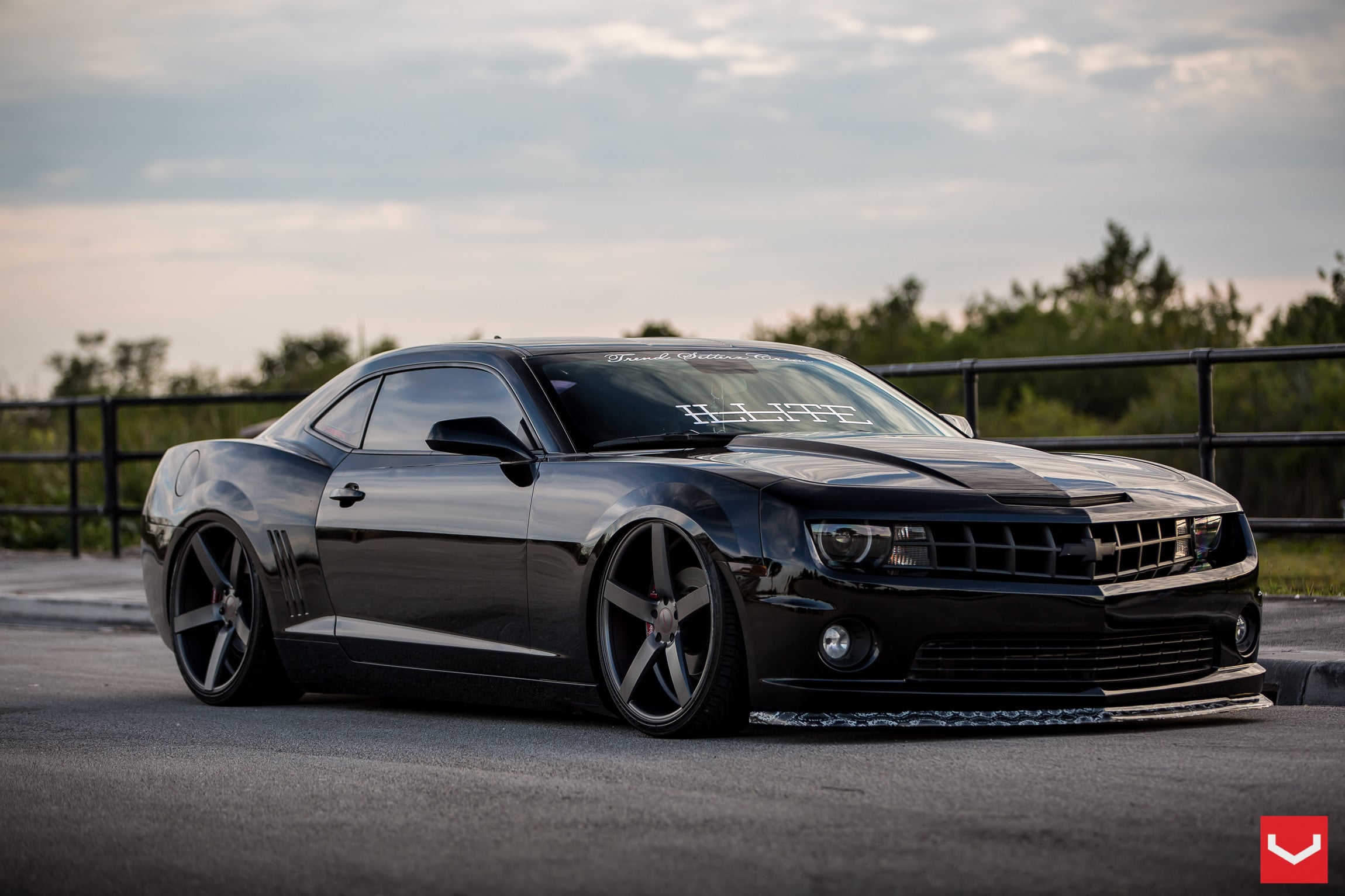 Lowered Black Chevy Camaro with Custom Hood - Photo by Vossen