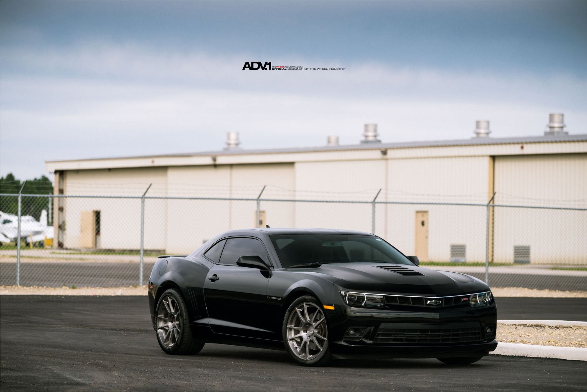 Black Chevy Camaro with Dark Smoke Headlights - Photo by ADV.1