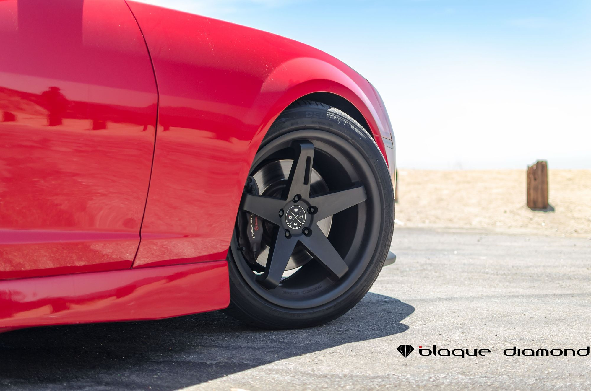 Red Chevy Camaro on Matte Black Blaque Diamond Rims - Photo by Blaque Diamond