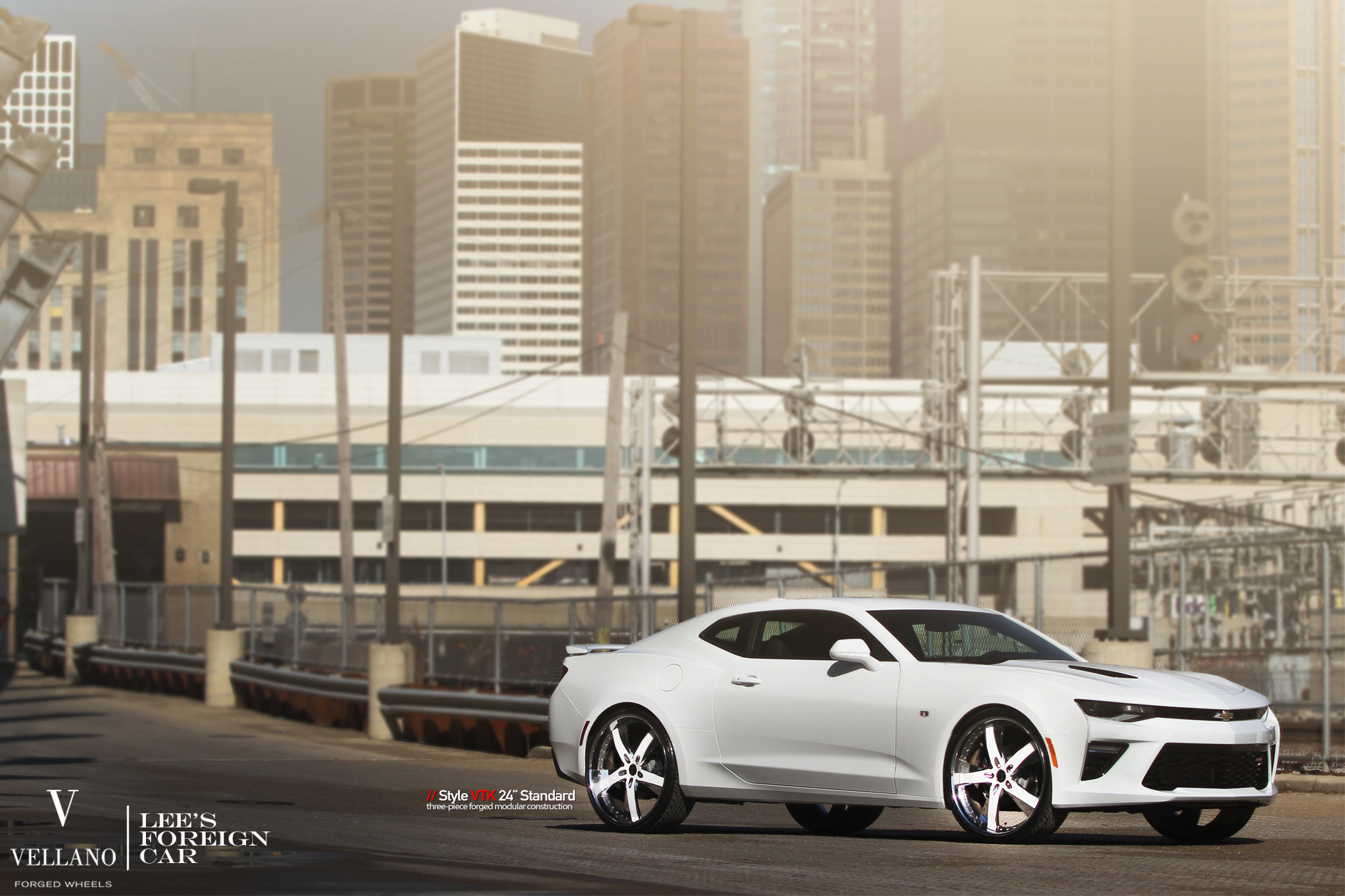 White Chevy Camaro with Aftermarket Front Bumper - Photo by Vellano