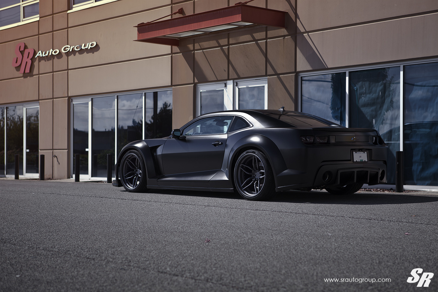 Black Chevy Camaro with Dark Smoke Taillights - Photo by SR Auto Group
