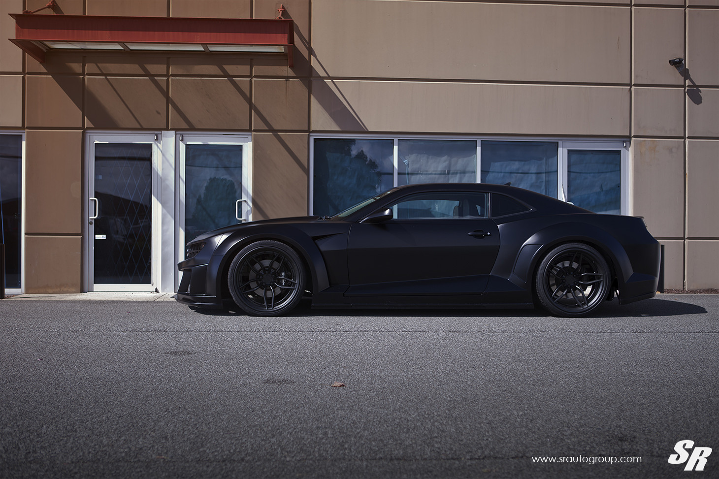 Aftermarket Side Skirts on Black Chevy Camaro - Photo by SR Auto Group