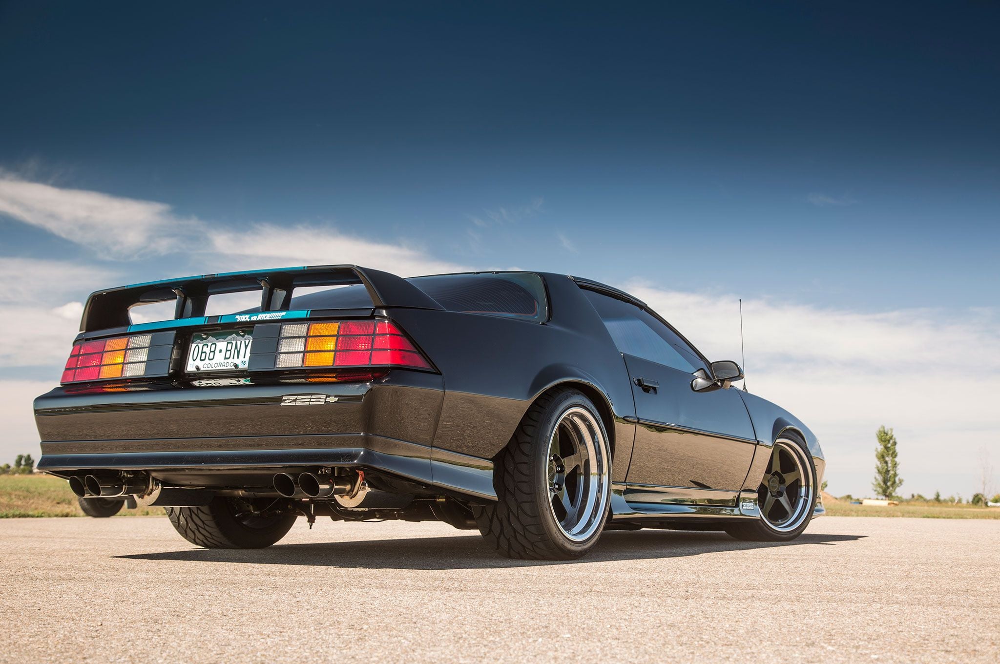 Aftermarket Rear Spoiler on Dark Blue Chevy Camaro Z28 - Photo by Forgeline Motorsports