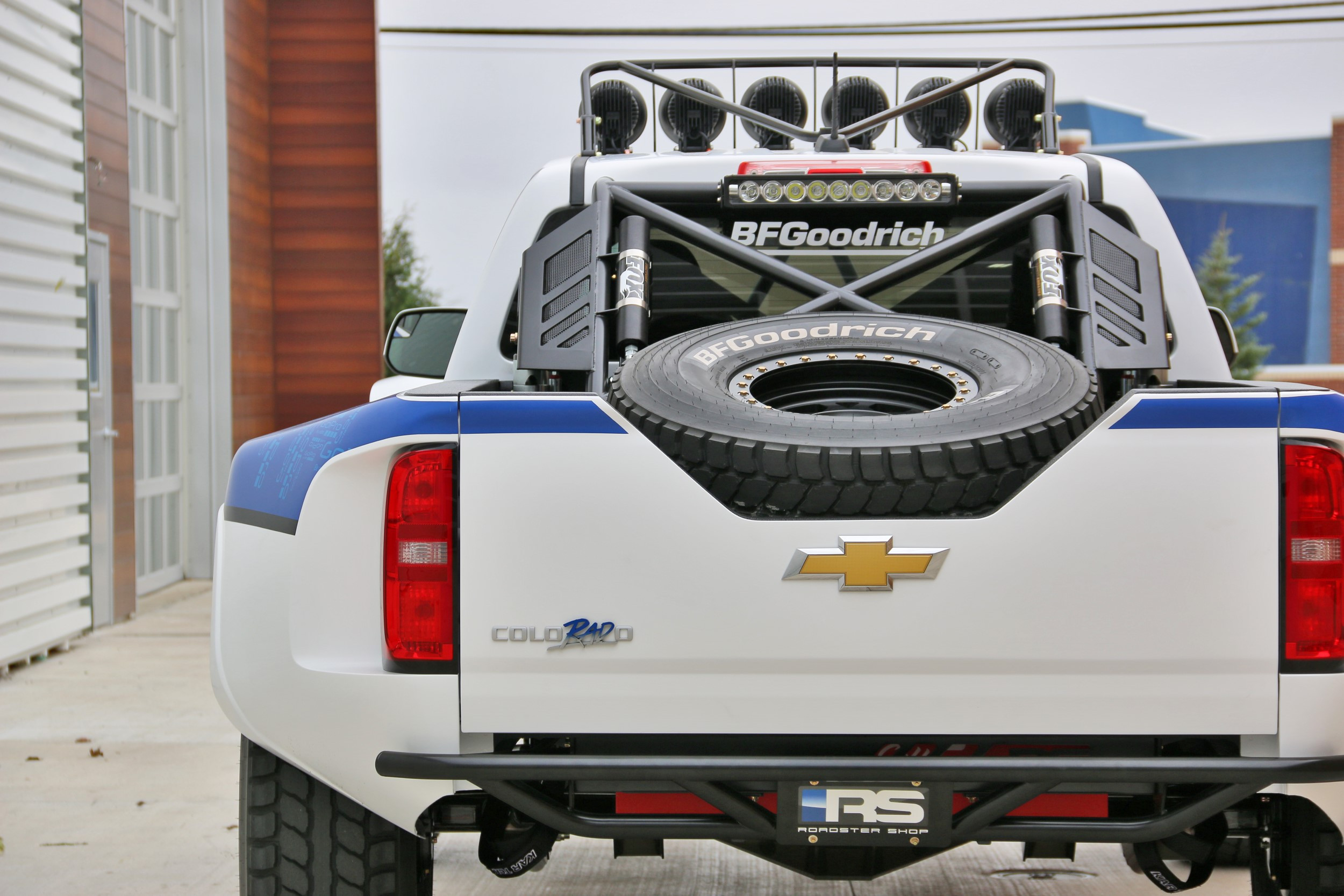 White Lifted Chevy Colorado with Red LED Taillights - Photo by Roadster Shop