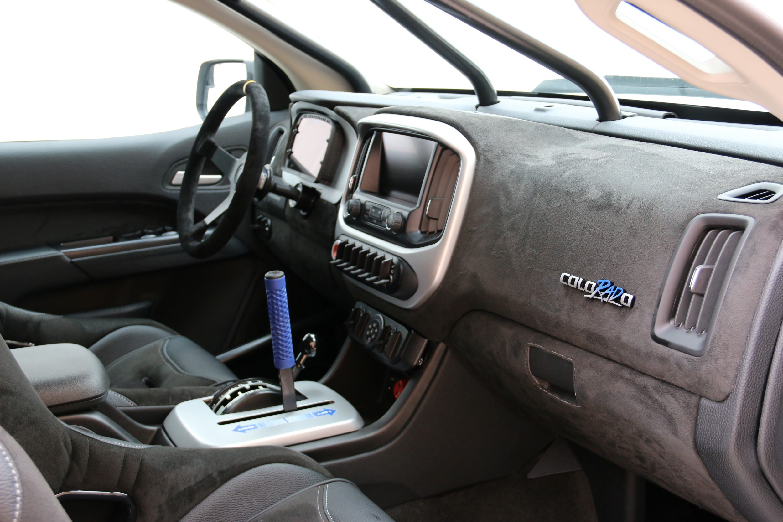 White Chevy Colorado with Custom Interior Trim - Photo by Roadster Shop