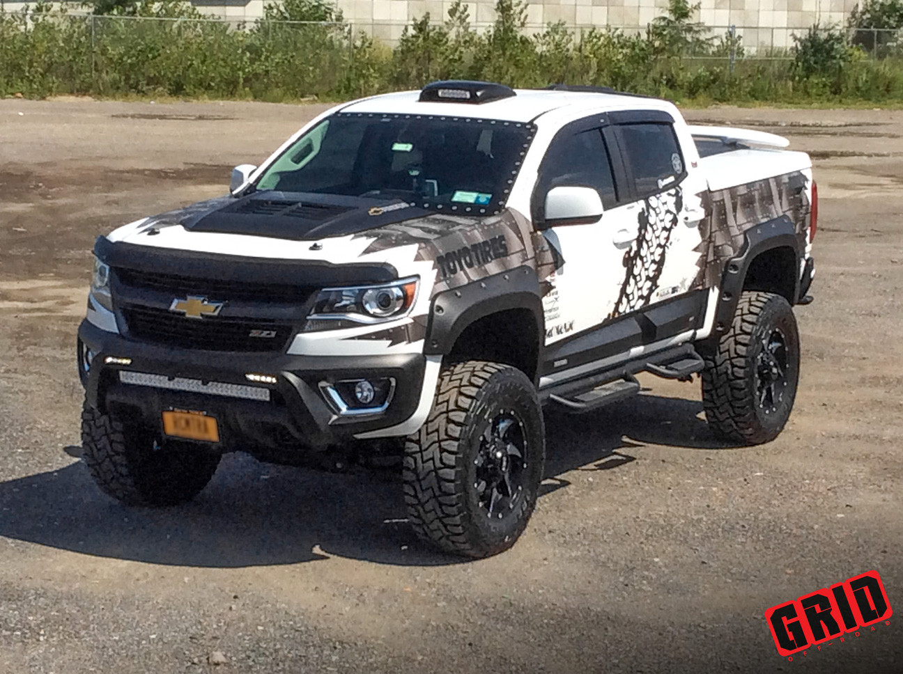 Custom Painted Chevy Colorado with Off-Road Front Bumper - Photo by Grid Off-Road