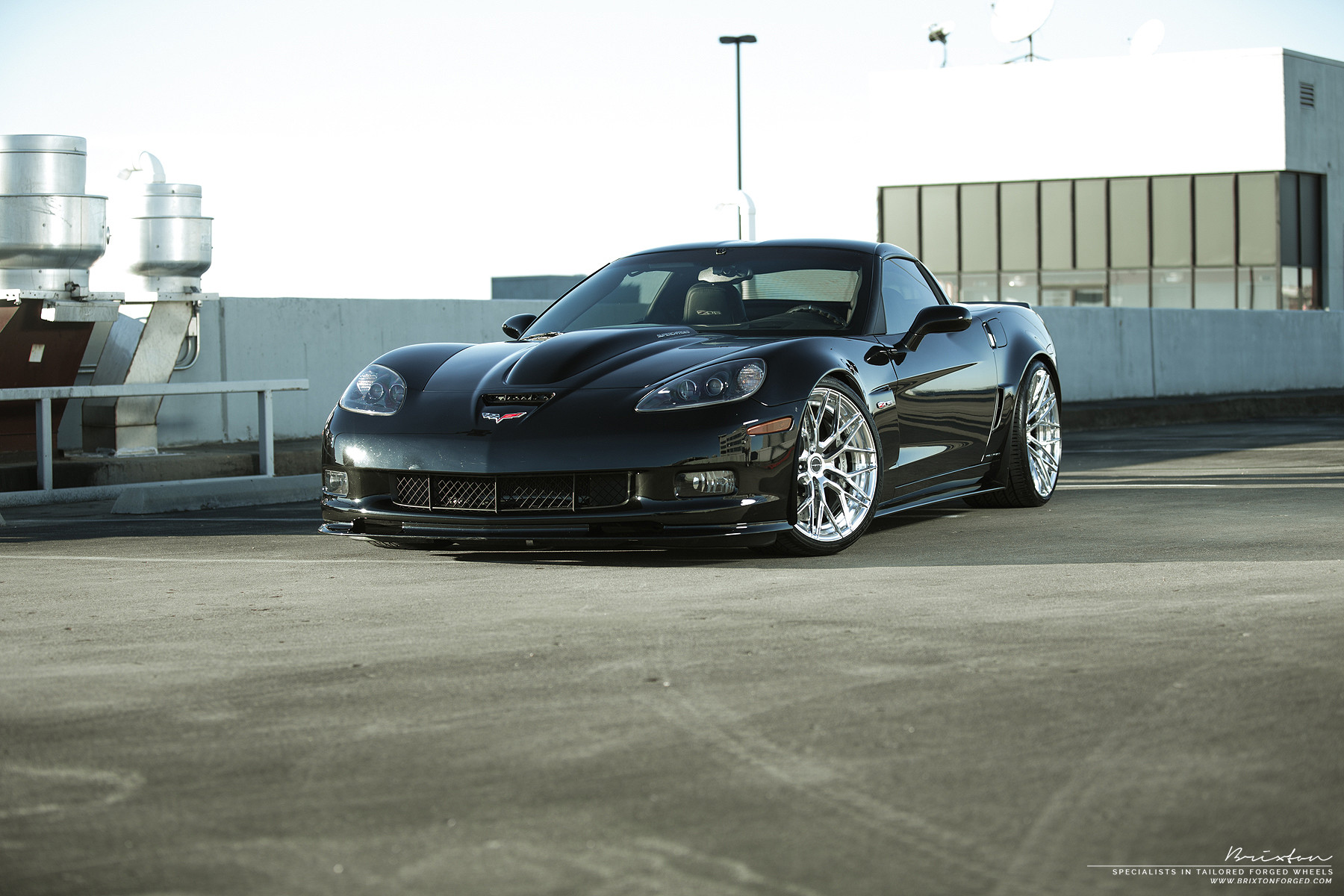 Front Bumper with Fog Lights on Black Chevy Corvette - Photo by Brixton Forged Wheels