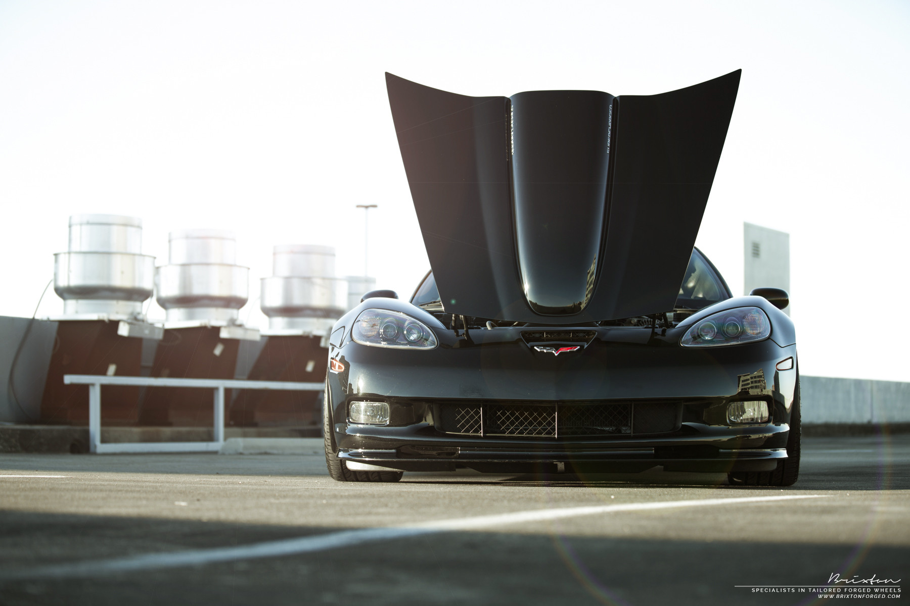 Black Chevy Corvette Z06 with Custom Halo Headlights - Photo by Brixton Forged Wheels