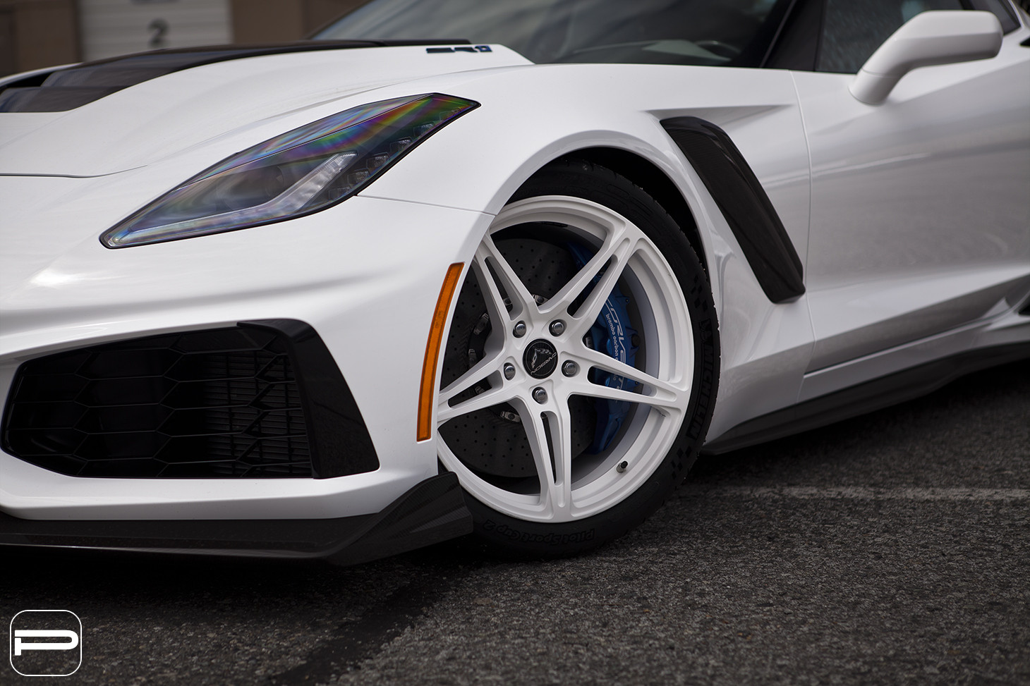 PUR Rims with Blue Brakes on White Chevy Corvette - Photo by PUR Wheels