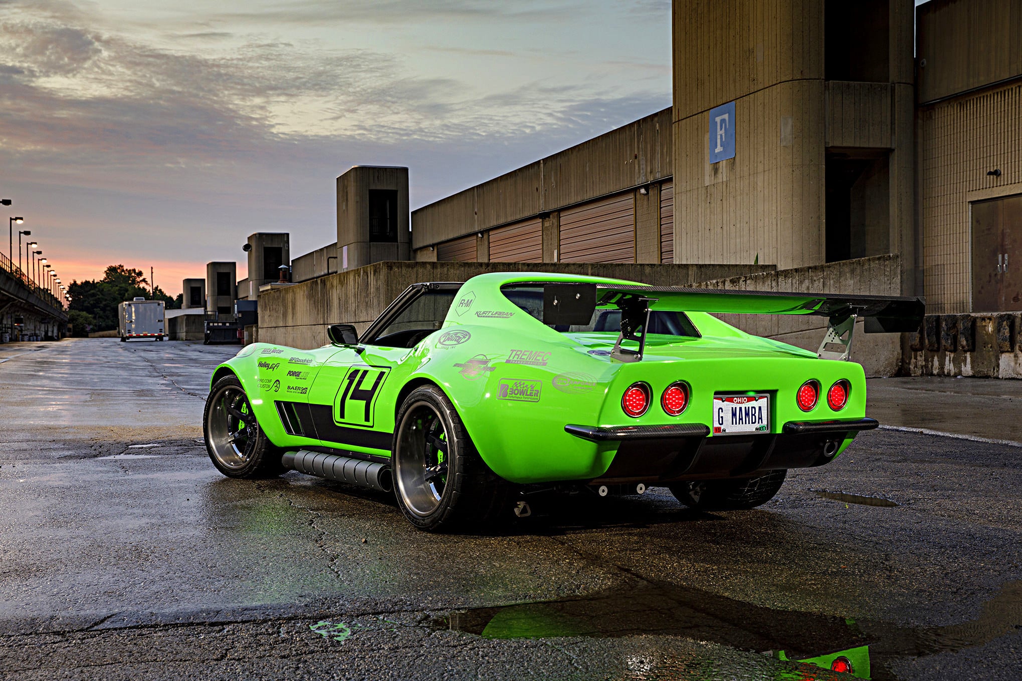 Large Wing Spoiler on Green Debadged Chevy Corvette - Photo by Robert McGaffin