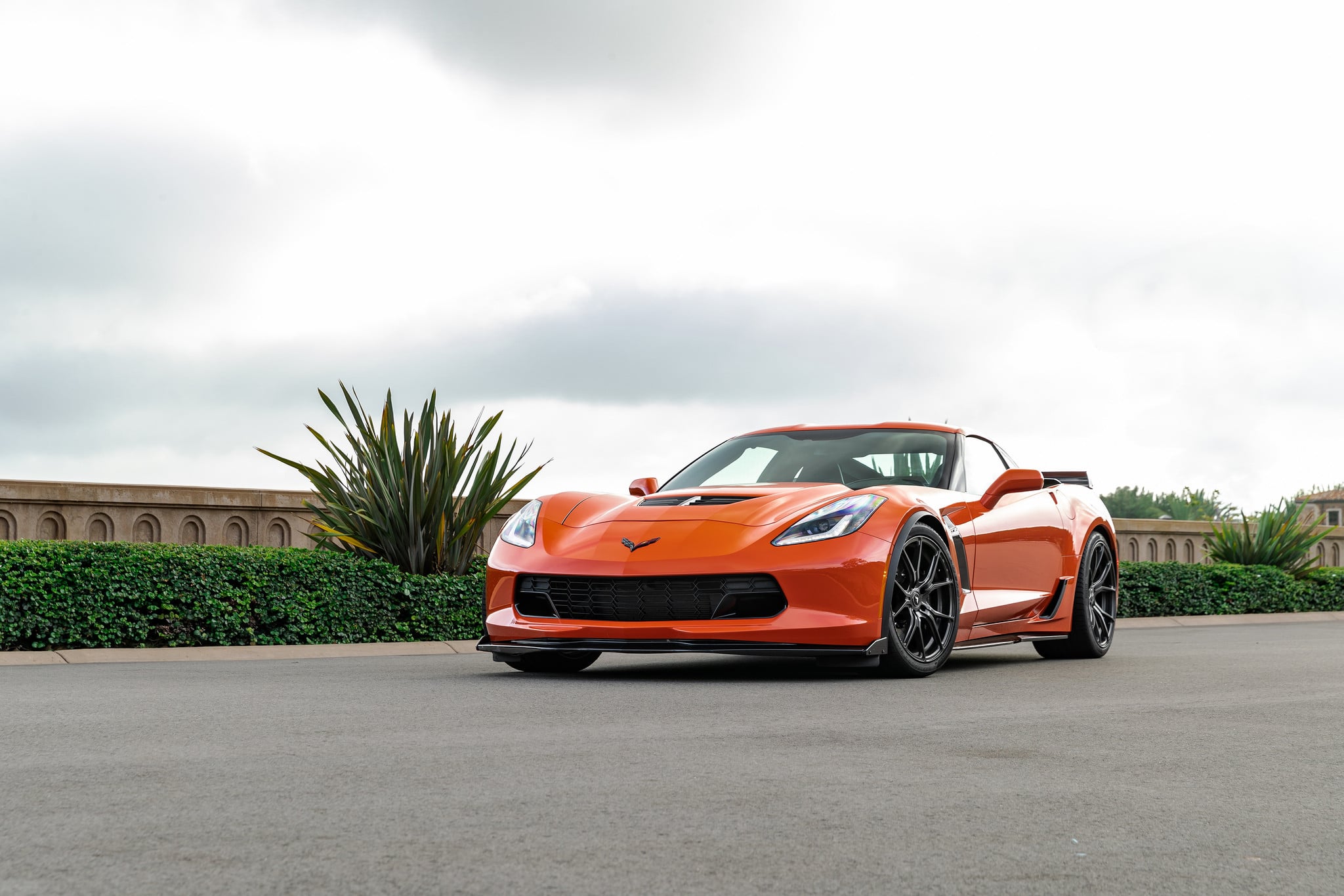 Aftermarket Vented Hood on Orange Chevy Corvette - Photo by Vorsteiner