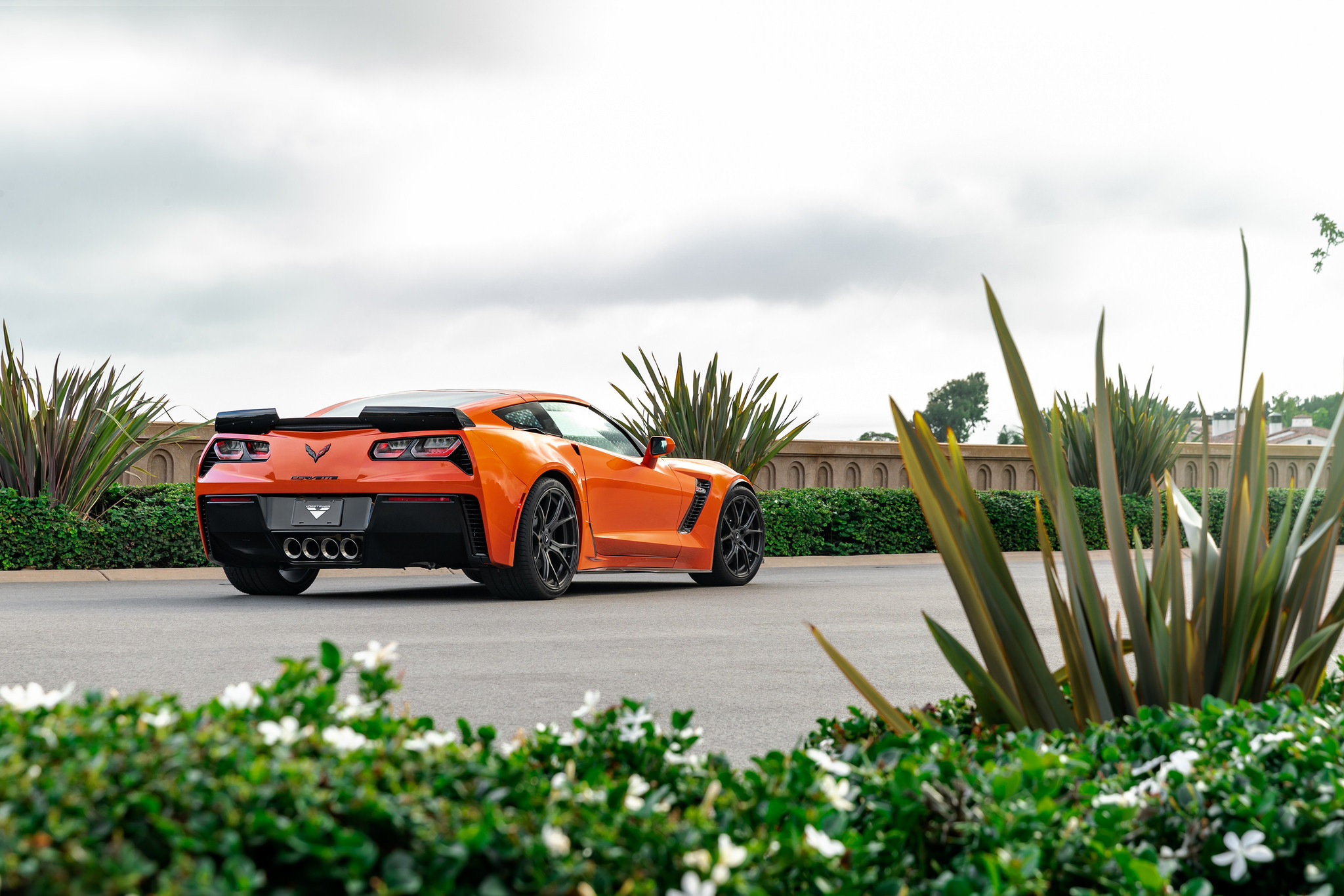 Aftermarket Rear Spoiler on Orange Chevy Corvette - Photo by Vorsteiner