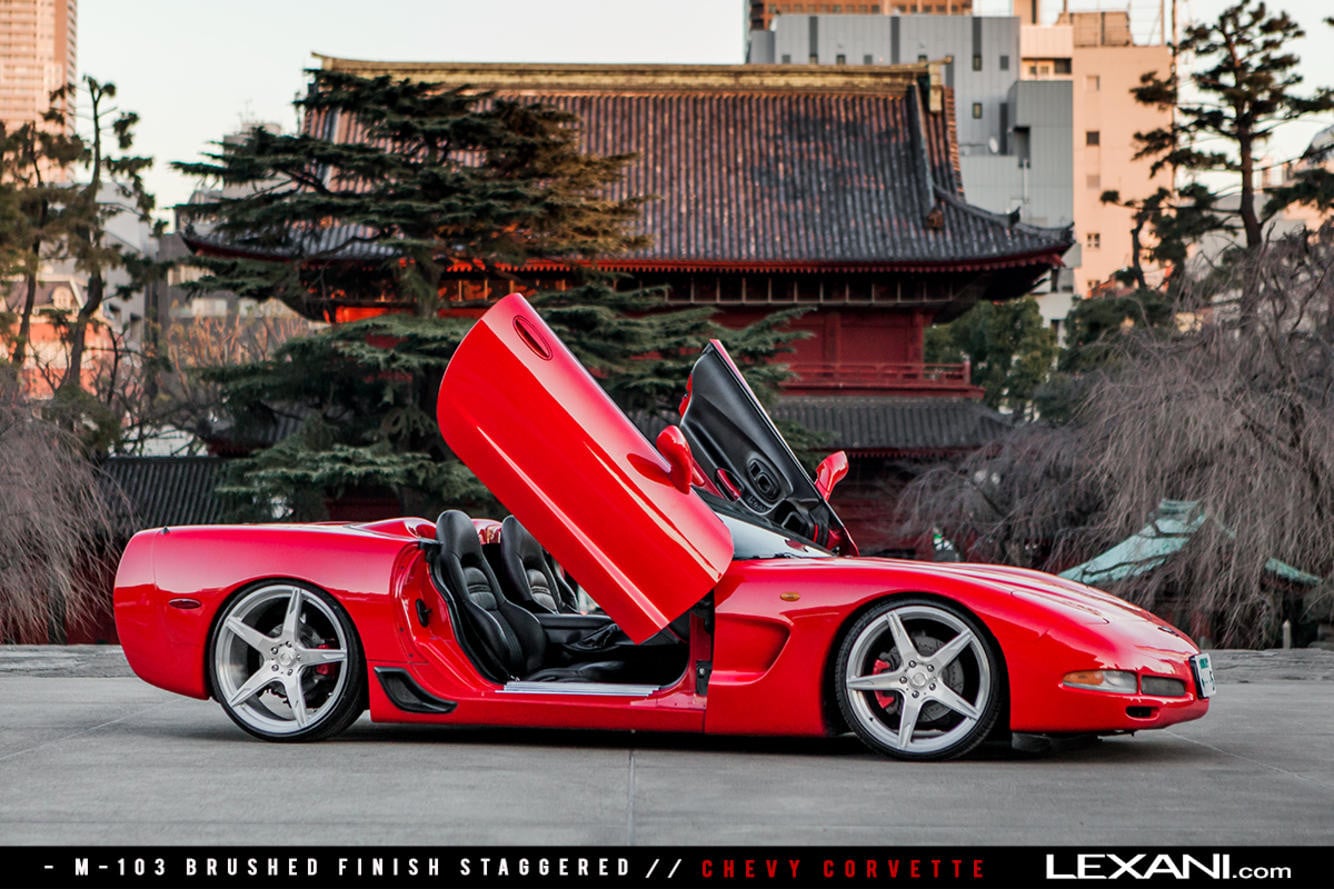 Custom Candy Red Chevy Corvette with Vertical Doors - Photo by Lexani