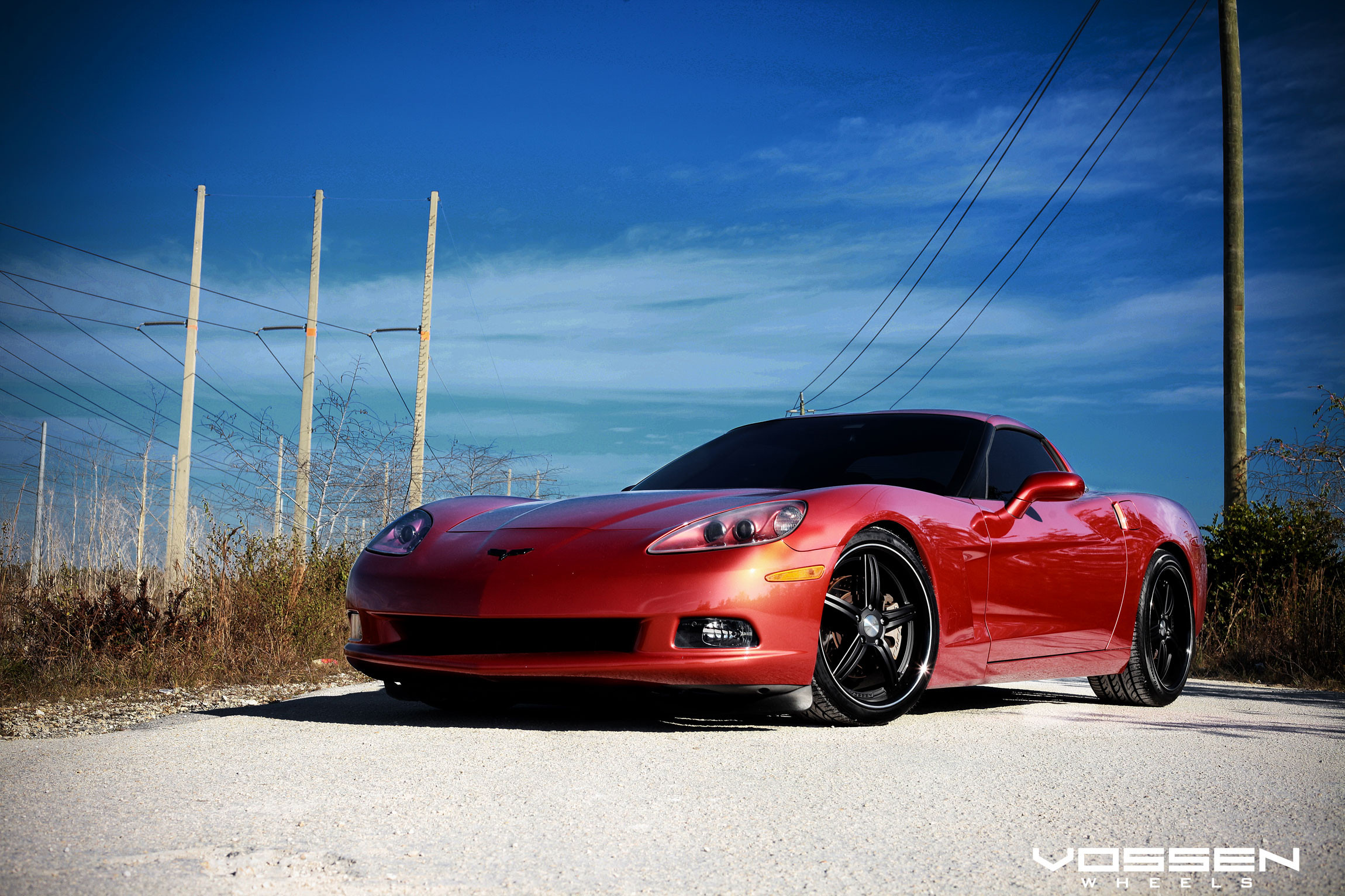 Gloss Red Chevy Corvette with Custom Headlights - Photo by Vossen