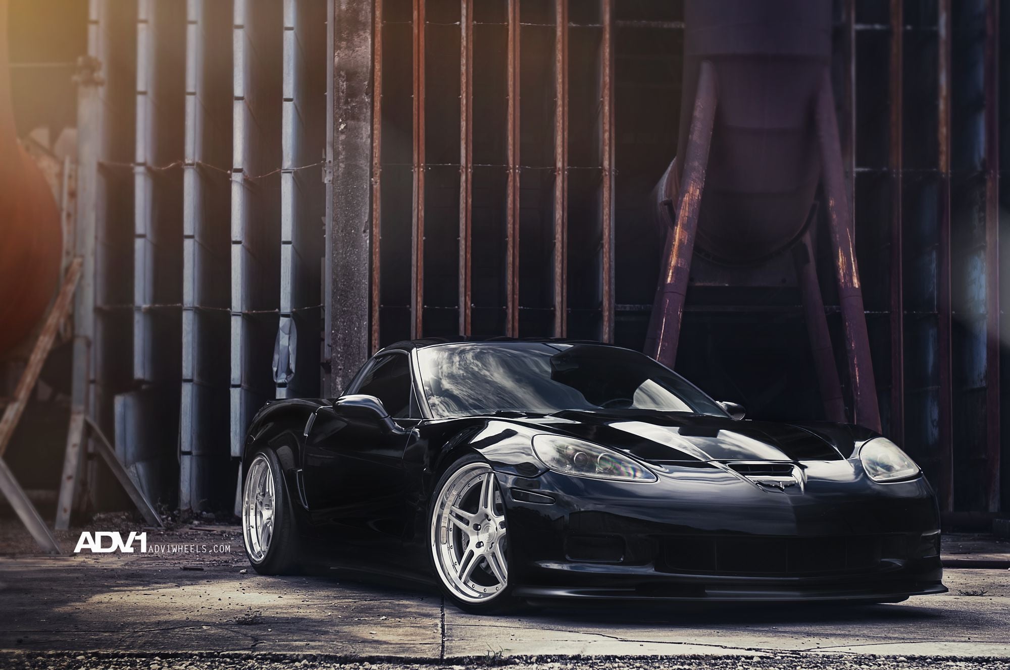 Black Chevy Corvette with Custom Headlights - Photo by ADV.1