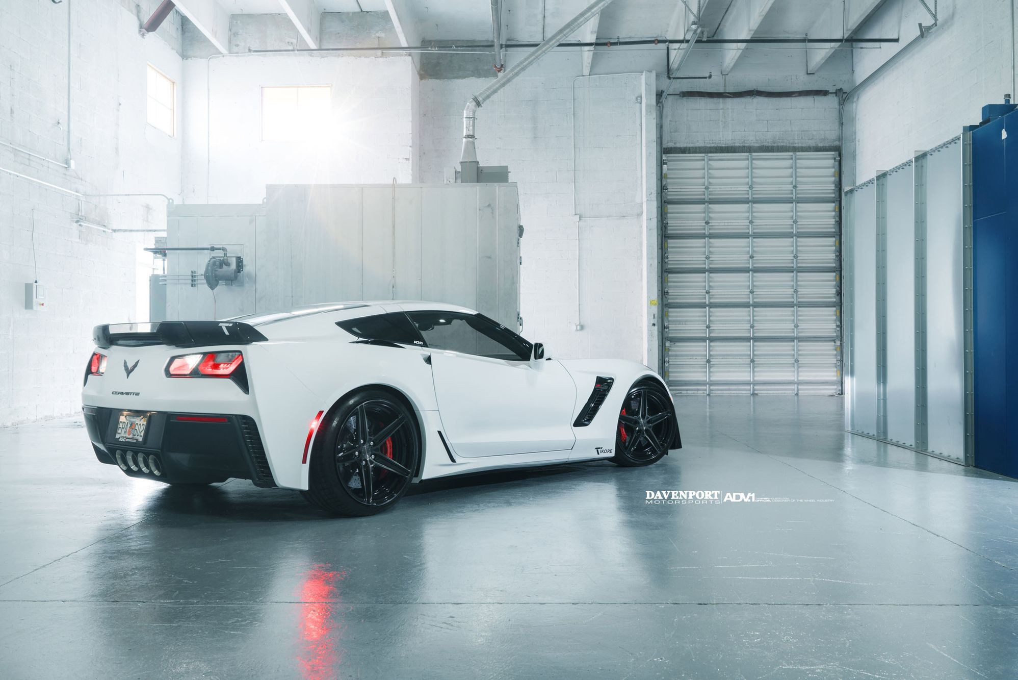 Custom Black Rear Spoiler on White Chevy Corvette - Photo by ADV.1