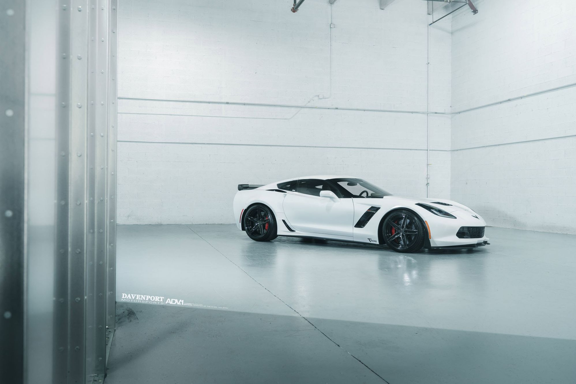 White Chevy Corvette C7 Aftermarket Side Skirts - Photo by ADV.1
